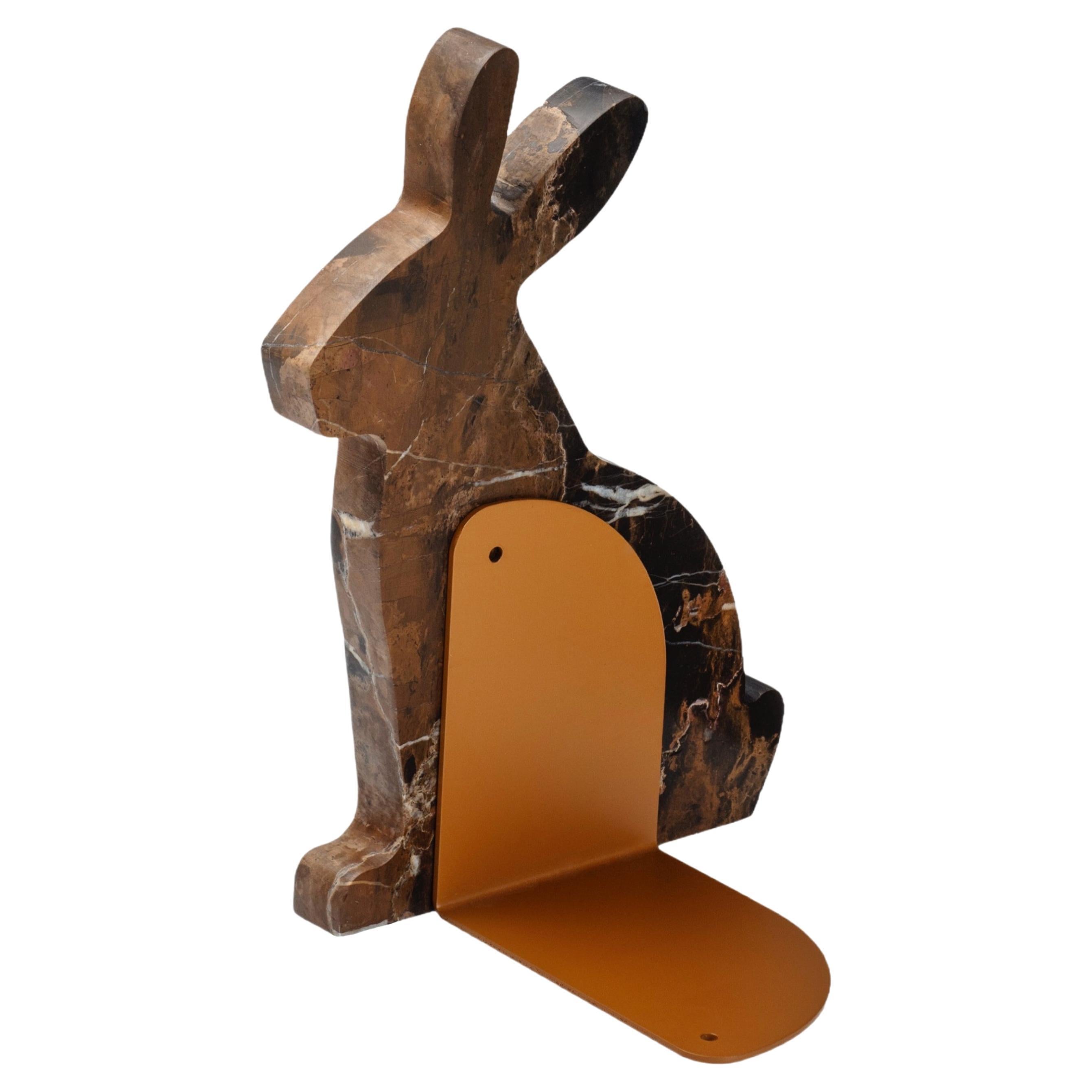 "Bunny" left bookend in Black & Gold marble in the shape of a rabbit