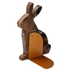 "Bunny" left bookend in Black & Gold marble in the shape of a rabbit