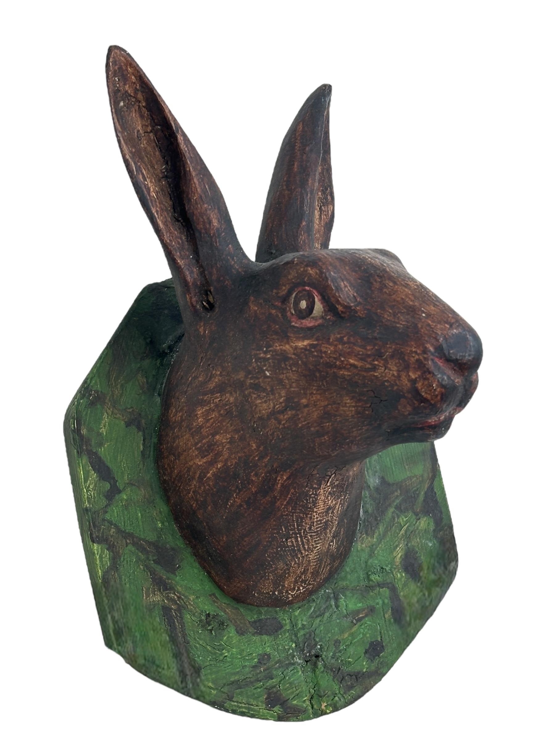 A great looking hand carved original wooden Folk Art Bunny head wall decoration. A great piece for a suitable ambiance in a trophy room or the office of a Hunter or Woodsman. More than likely one of the Folk Art items made between 1860 and the late