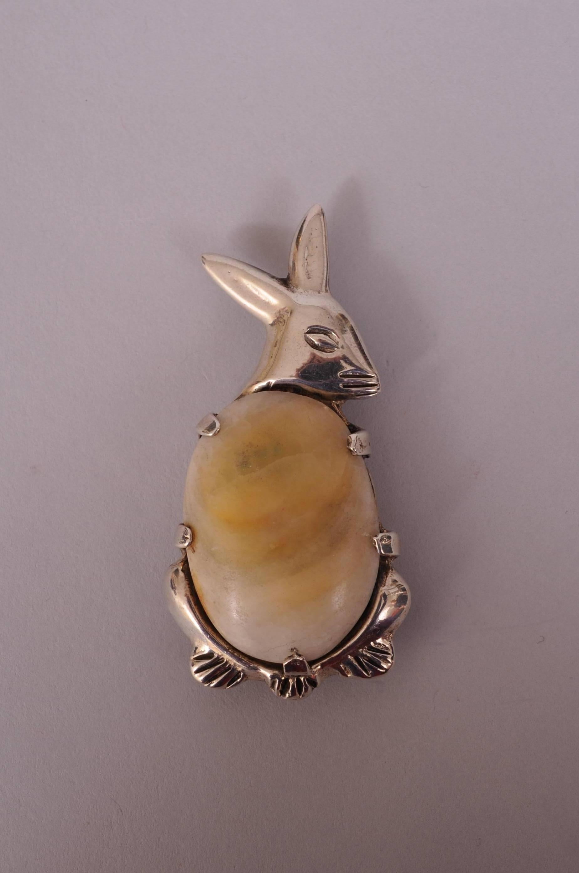 This charming little fellow has a sterling silver body surrounding his plump belly made from a large piece of agate. He is in excellent condition and marked Silver and Mexico on the back.
Measurements;   Height 3 3/4