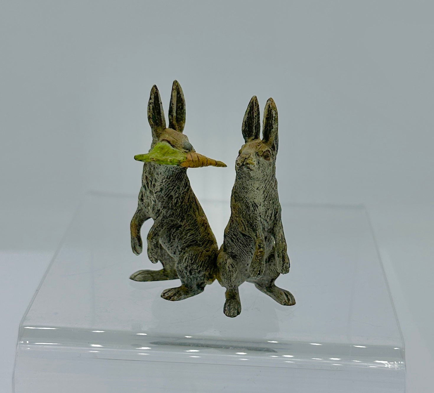 THIS IS A SUPERB ANTIQUE AUSTRIAN VIENNA BRONZE OF TWO BUNNY RABBITS HOLDING A CARROT.
This wonderful antique Austrian Vienna Bronze (Bronze de Vienne, Wiener Bronze, Cold Painted Bronze) dates to circa 1900-1930.  The bronze is of the highest