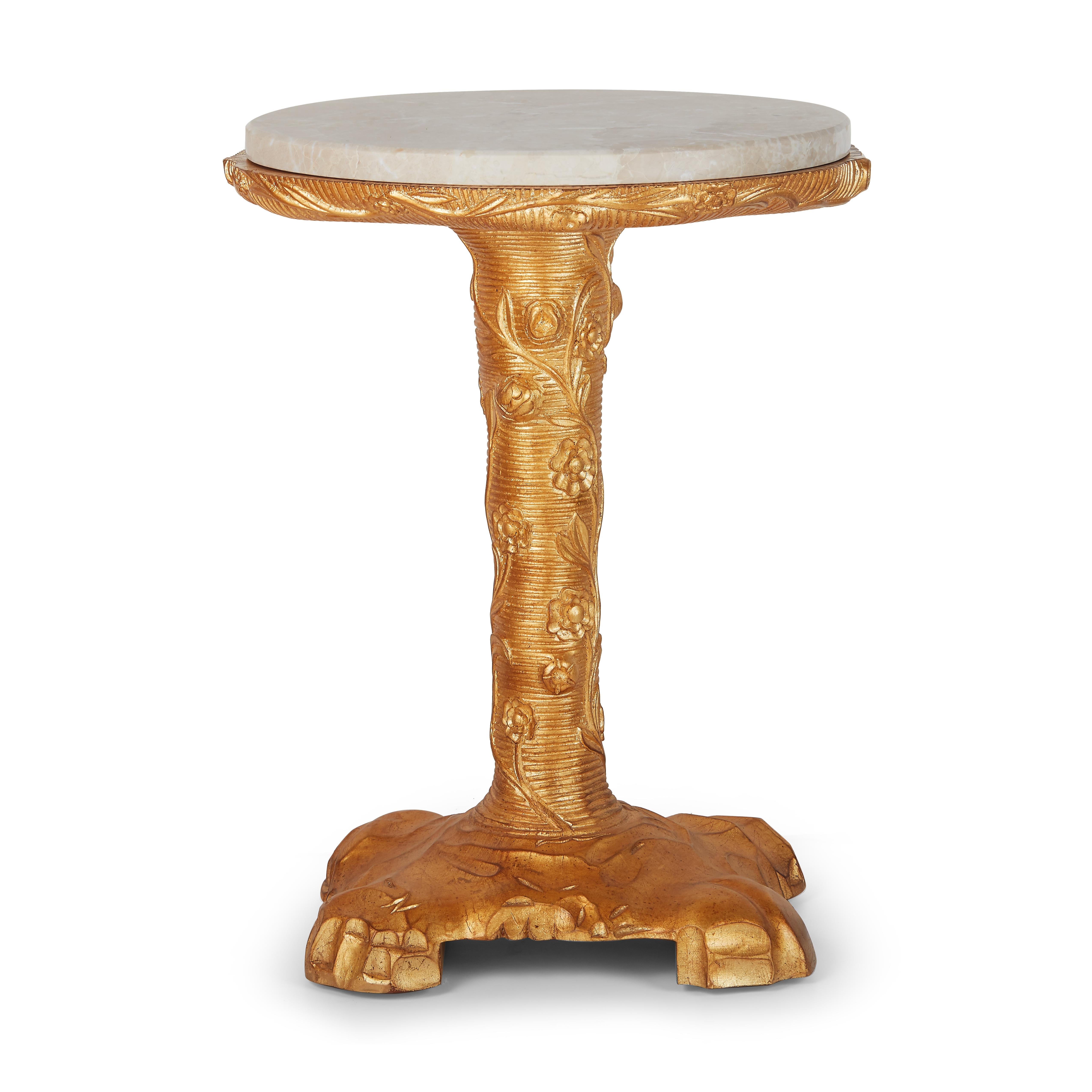 This magical little table is inspired by the 18th century Rococo art movement and truly embodies the joyful decorative nature of the time. Stylized vines, twigs and rock-like motifs gleam with a lustrous hand-gilded finish. The smooth marble top