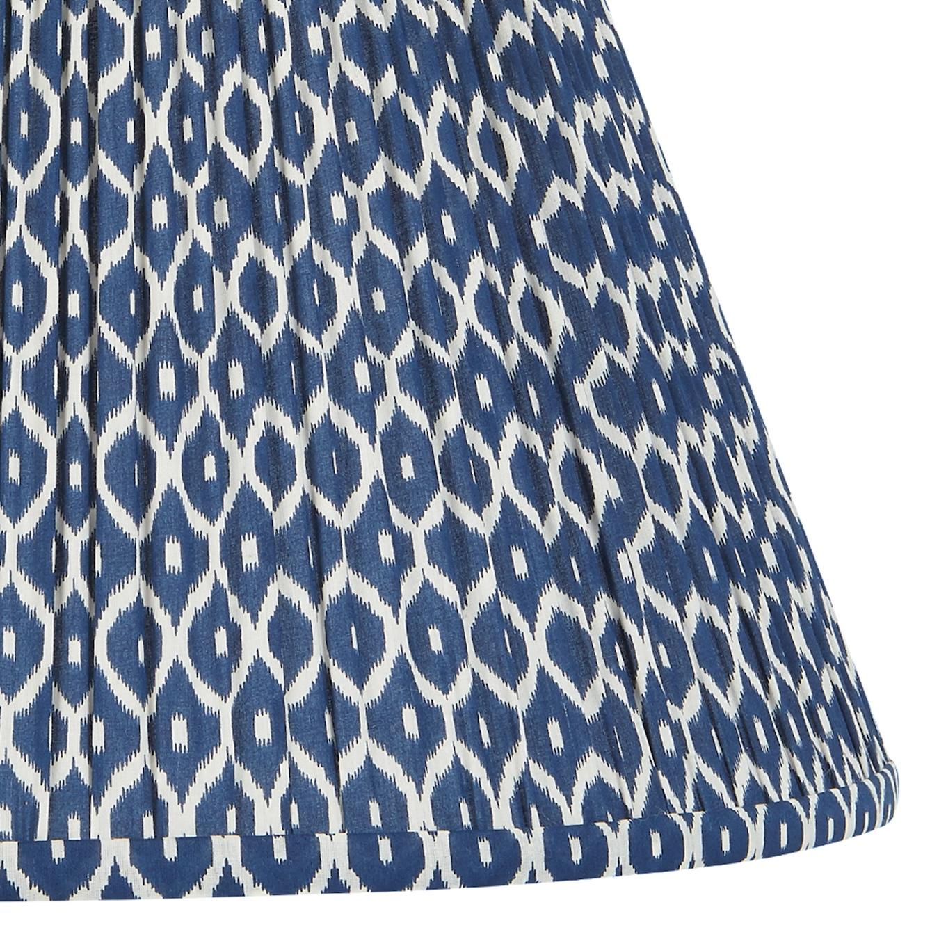 Patterned lampshades have long been a decorator’s secret to add color and texture to a space in a unique way. Our exclusive patterned shades are the perfect tool for this - made of cotton voile fabric that is handblocked in India and shirred and