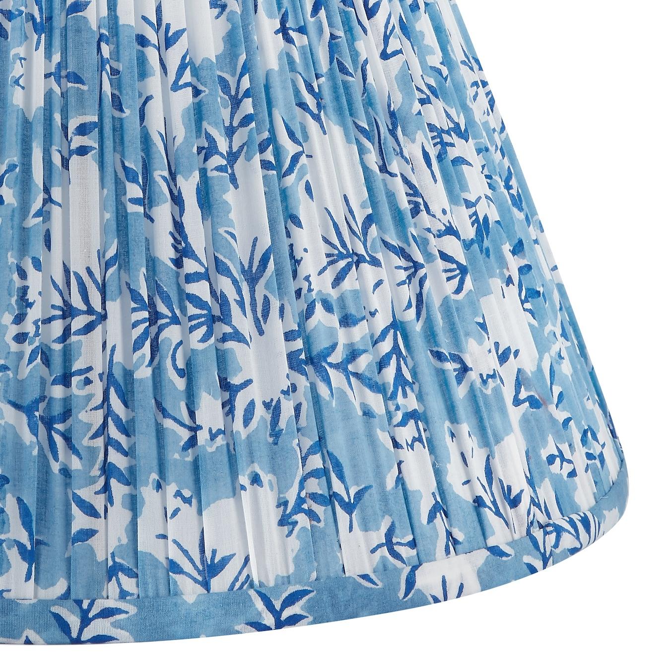 Charming dark blue branches are arrayed across a mid-tone blue field.

Available in two sizes:
15” x 8