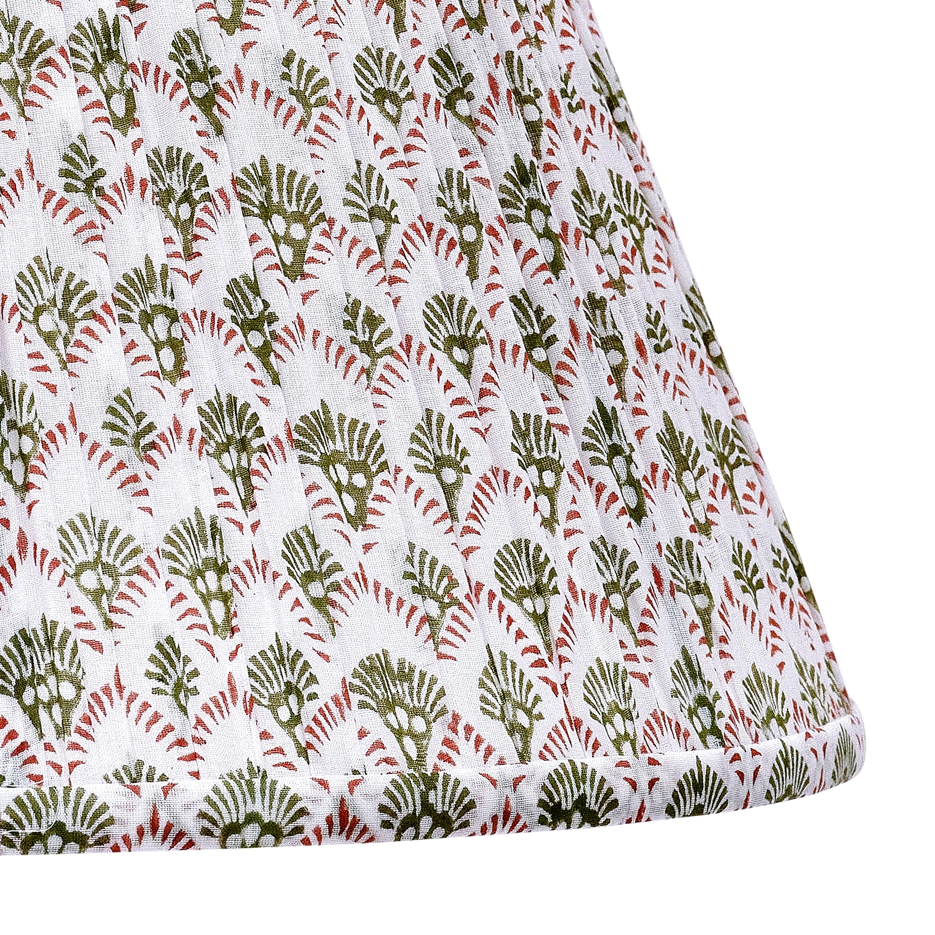 Patterned lampshades have long been a decorator’s secret to add color and texture to a space in a unique way. Our exclusive patterned shades are the perfect tool for this - made of cotton voile fabric that is handblocked in India and shirred and