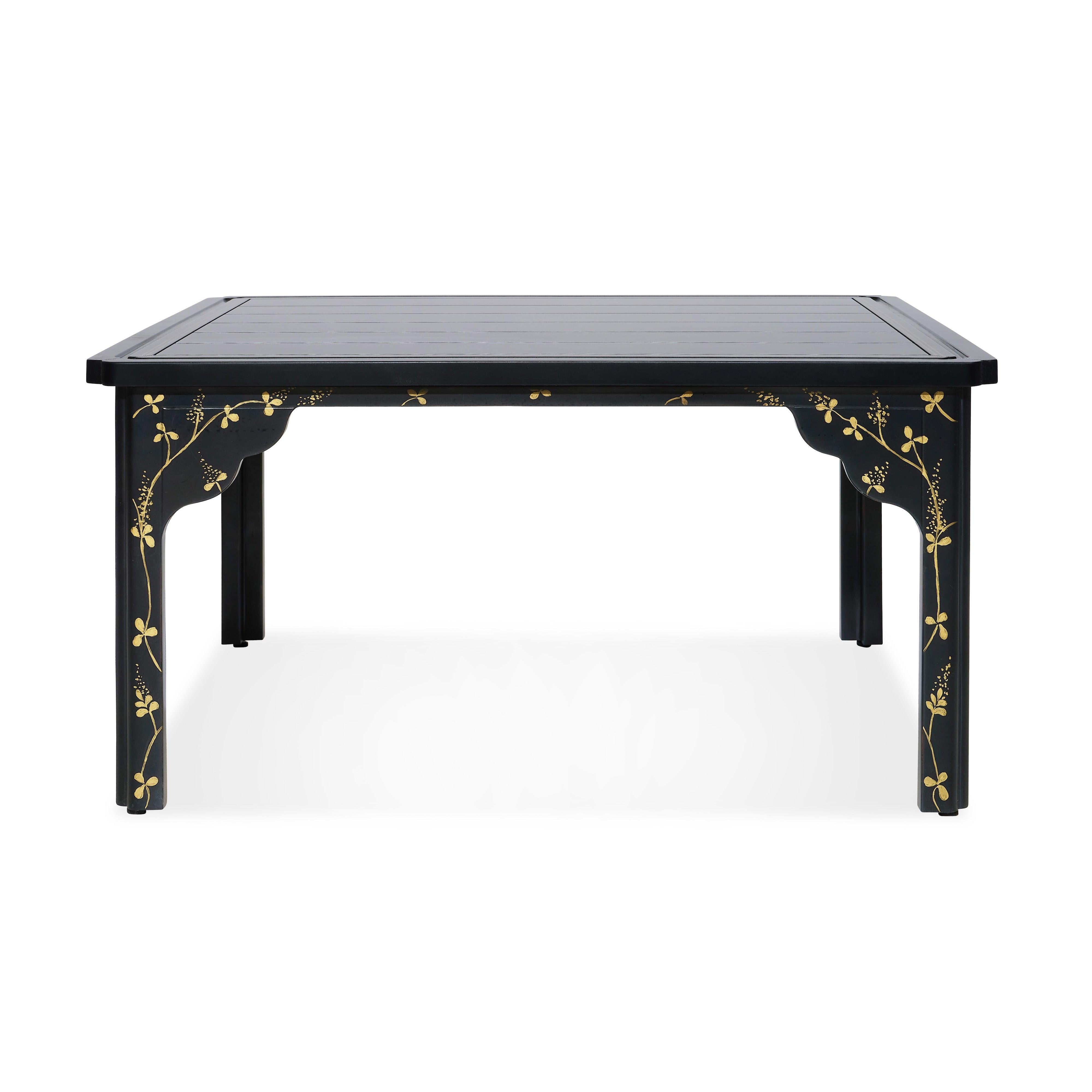 Inspired by Bunny's own antique lacquer coffee table, which she uses in her country house, ours features a soft lacquer glow, with board grooves evident, evincing its handcrafted nature. With gold floral accents on its legs and a double gold line