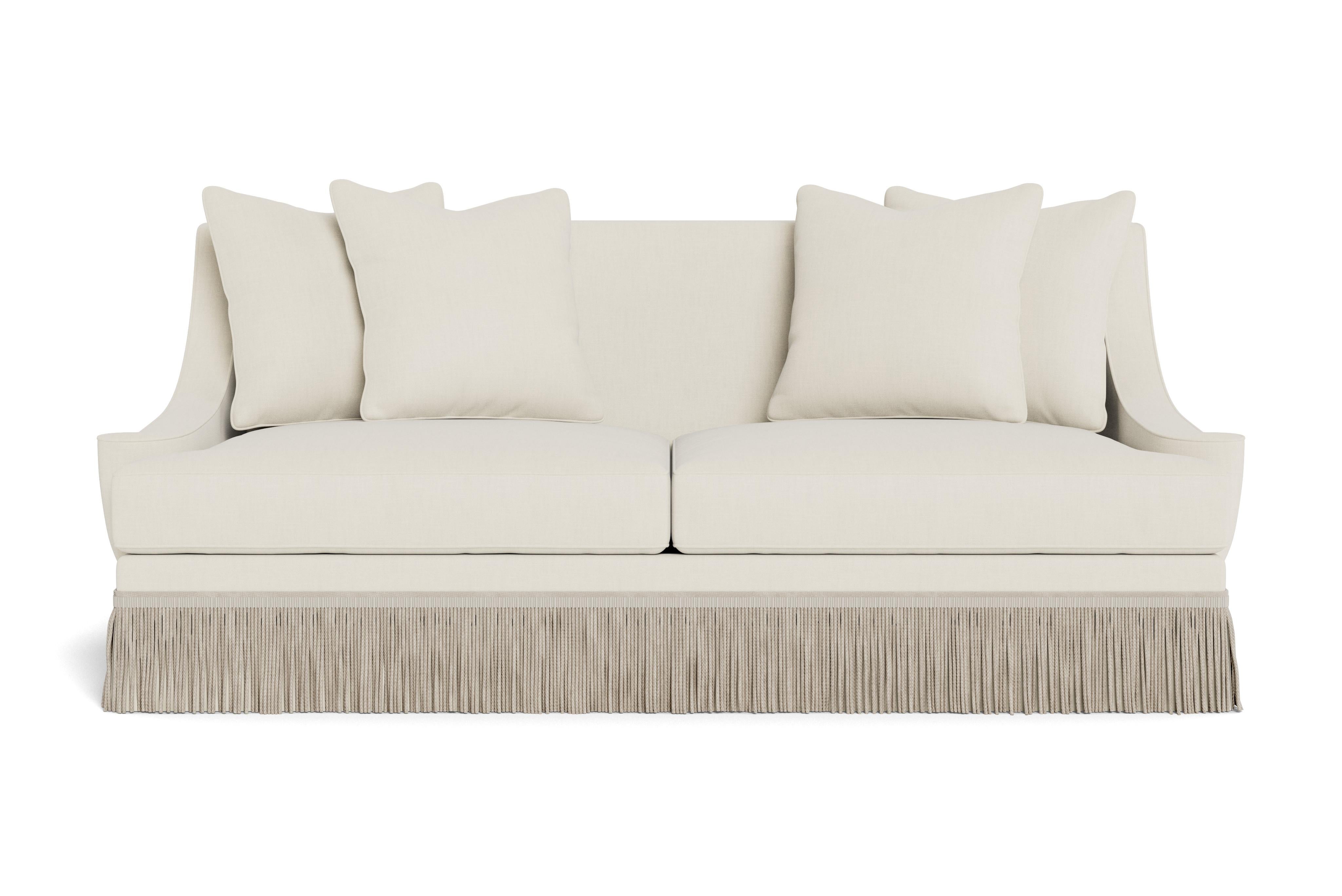A deep, comfortable, and sophisticated sofa. Welcoming, curvaceous arms descend and slightly flare out, a sophisticated design complemented by 8.25