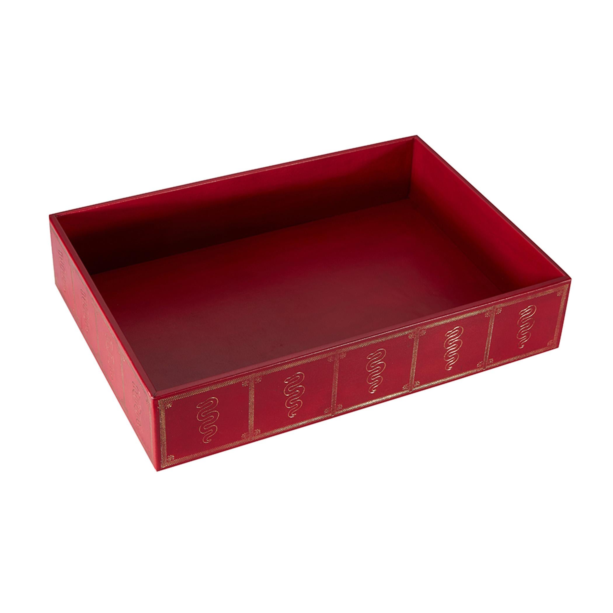 Our handsome red leather Everett tray, with serpentine embossing, is a capacious size for all sorts of documents, ideal for use on a desktop or on a lower shelf of a tiered table for storing papers.

15.25
