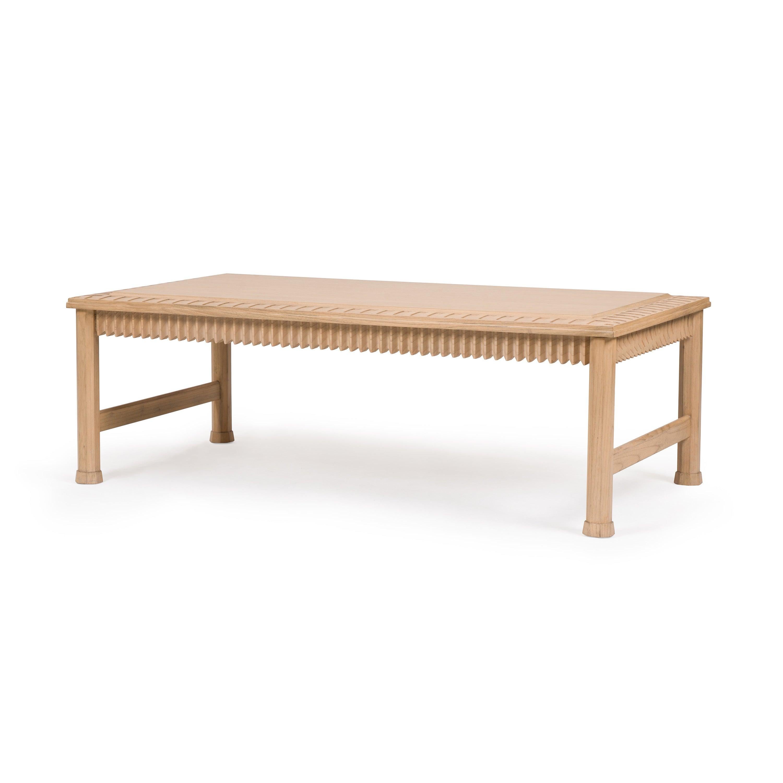 Is this the perfect coffee table? A statement without shouting, one that blends in but, at a glance, also stands out? In our favorite new gray-washed oak finish, our Inez coffee table features a variety of carving, from shallow grooving along the
