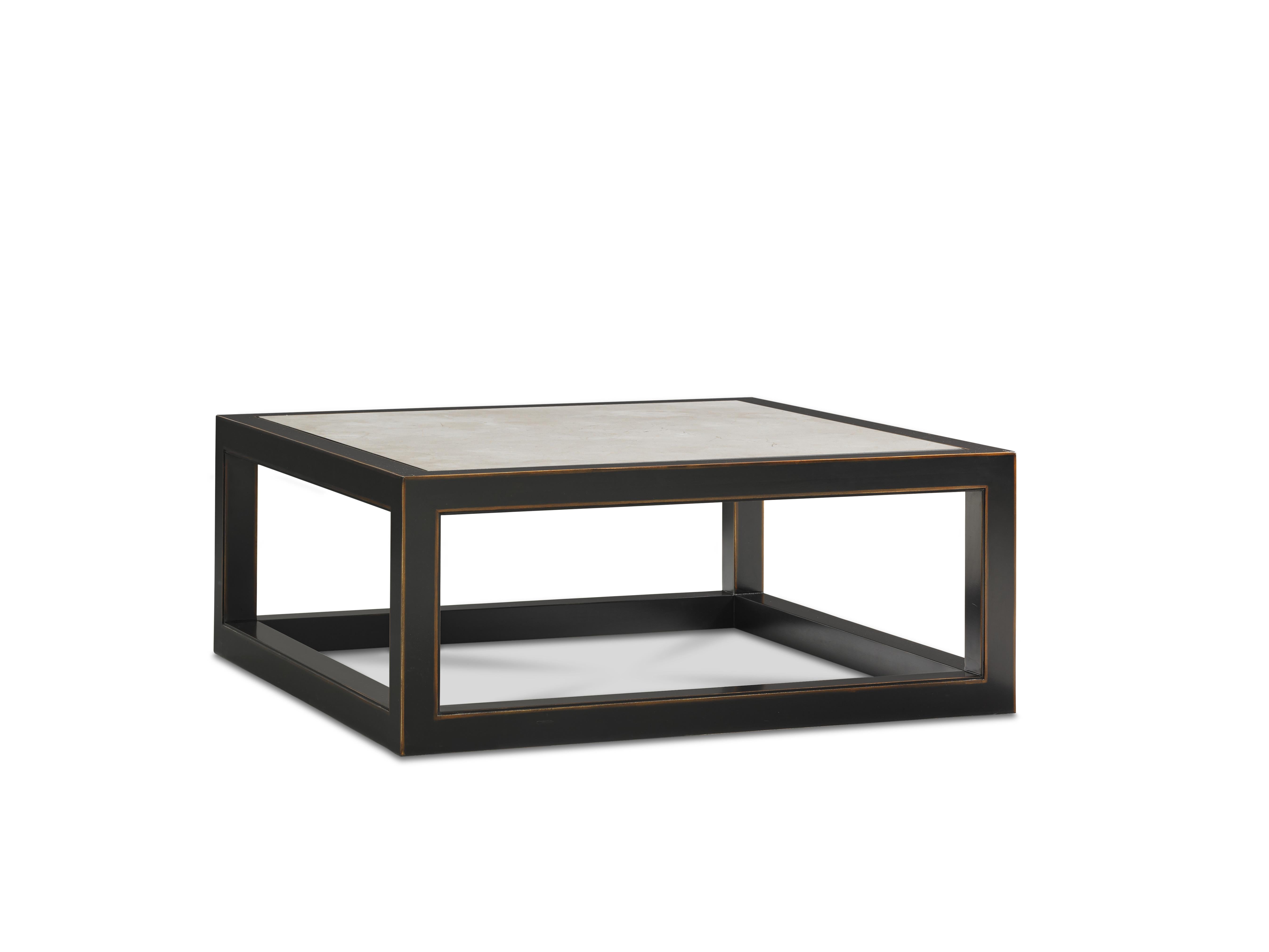 Our Ming table is loyal to age-old traditional Chinese style, but incorporates modern sensibilities with its clean lines, rubbed ebony finish and black granite top. A wonderful statement piece for a minimalist living room, it is sure to be the focal