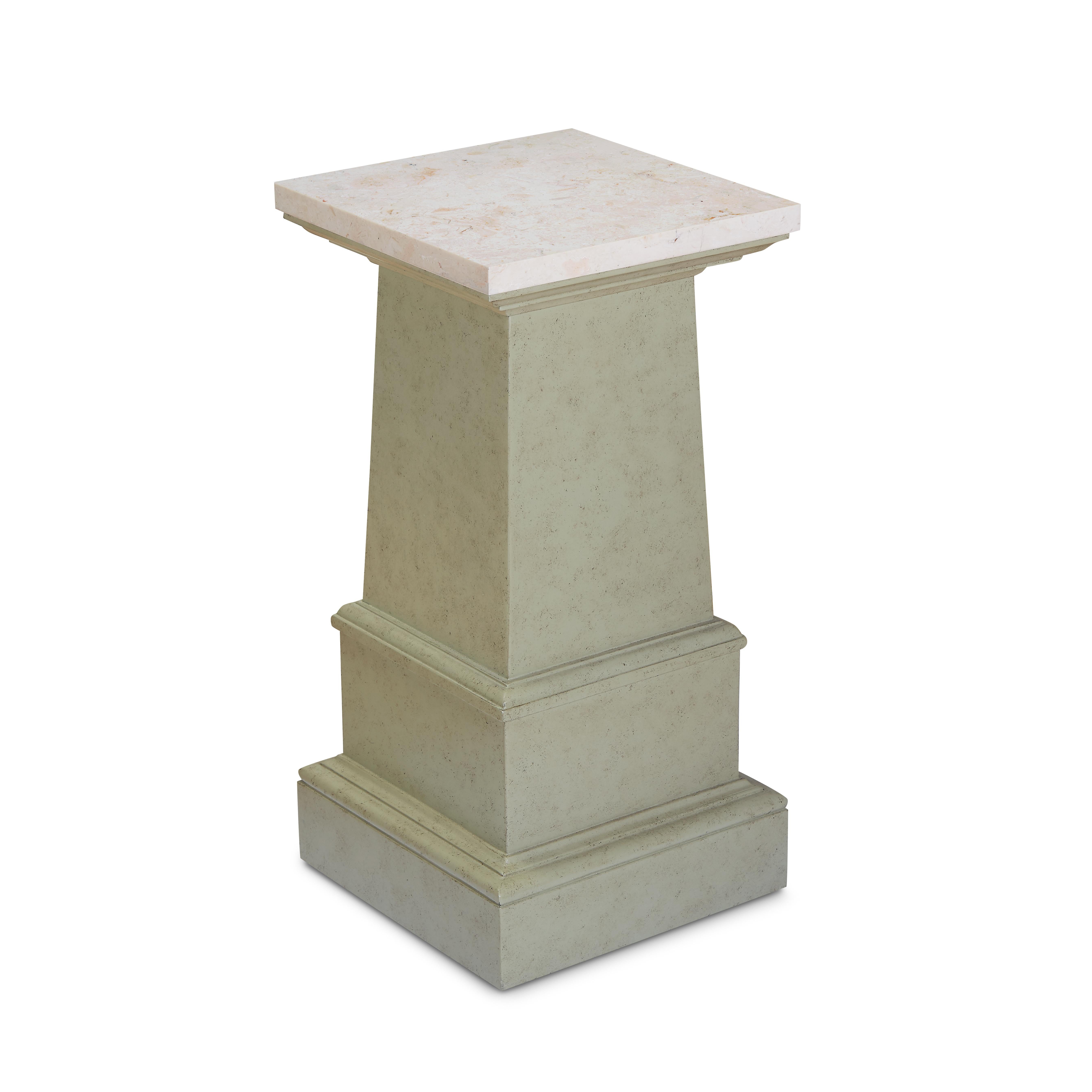 A pedestal drinks table, with an unusual painted green finish, our favorite sort of neutral color, with a capital top of honed marble--perfectly scaled for a morning cup of coffee or afternoon cocktail--sits atop a well-proportioned stepped plinth