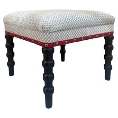 Sgabello Red Tape di Bunny Williams in pelle bovina intrecciata Nature con gambe in ebano