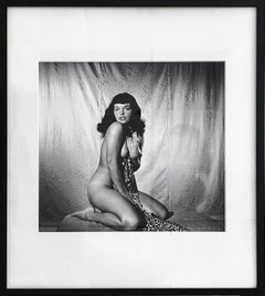 Bettie Page Clutching Robe, 1954 Framed