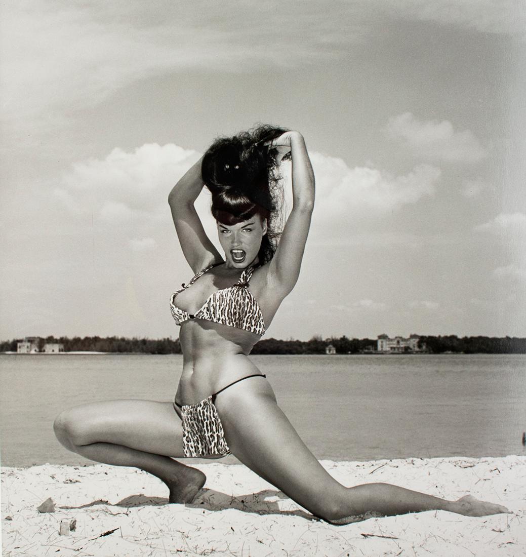 Bunny Yeager Black and White Photograph - Bettie Page in Leopard Bikini
