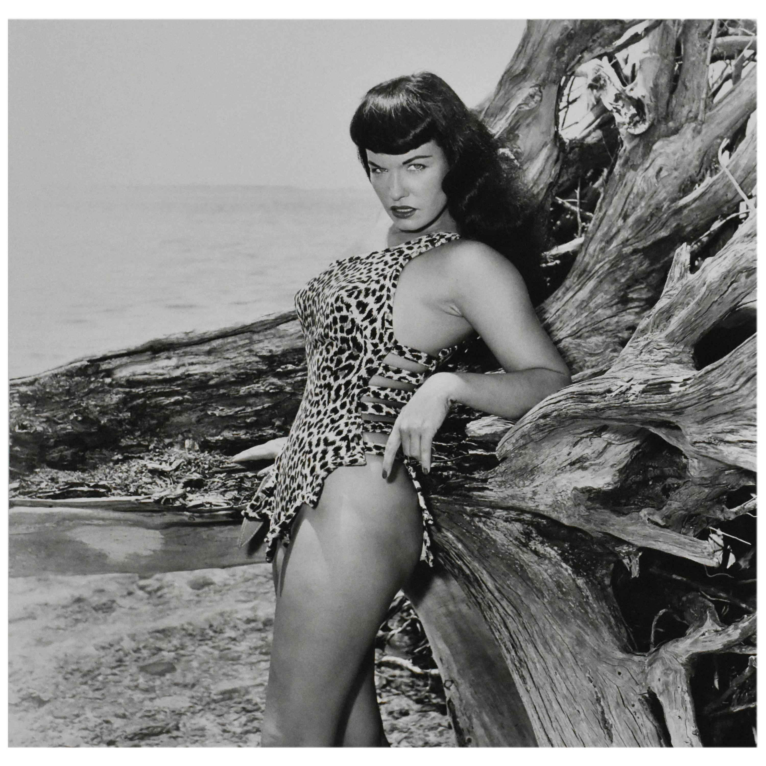 "Bettie Page with Driftwood, Key Biscayne, FL", 1954  - Photograph by Bunny Yeager