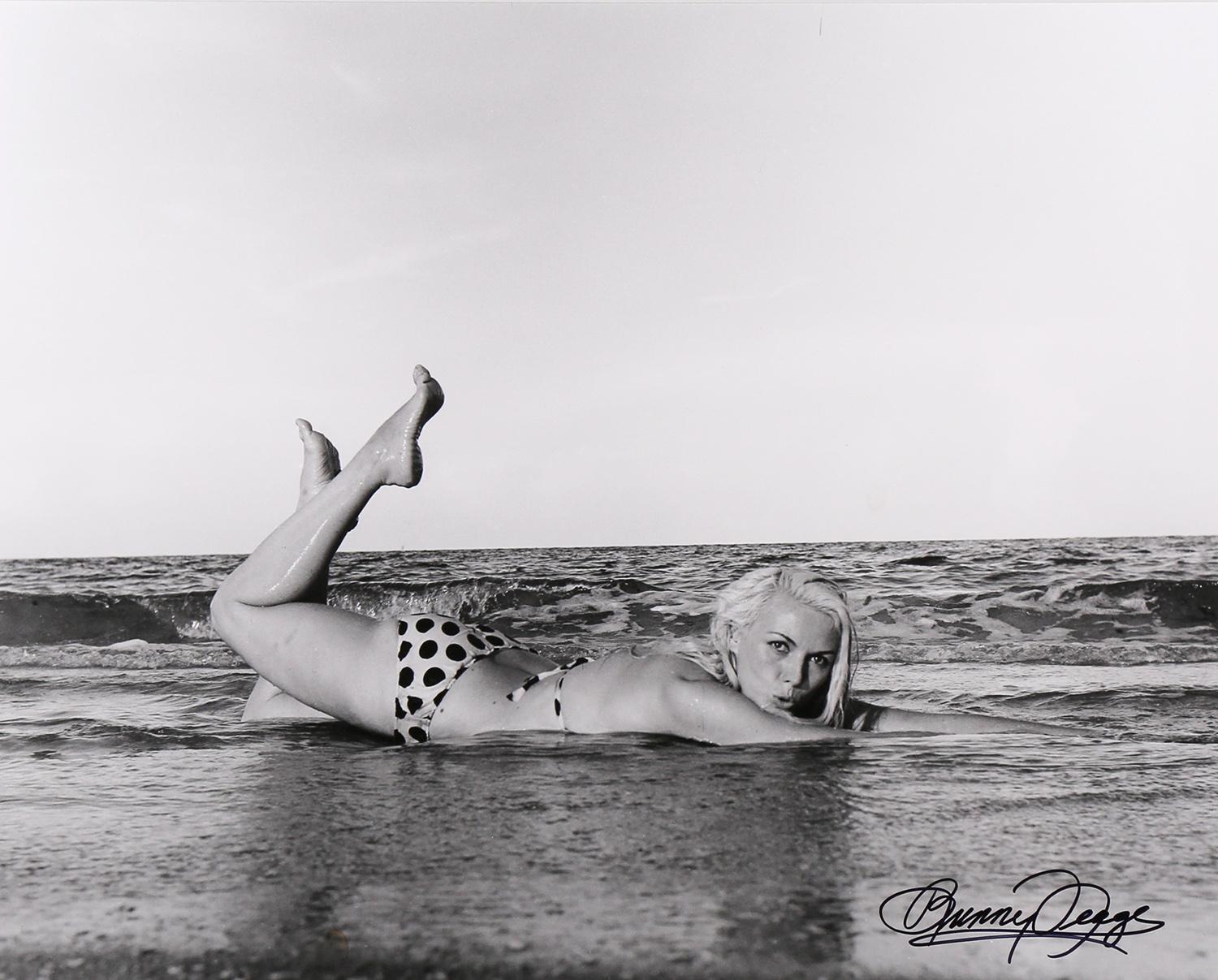 Bunny Yeager Portrait Photograph - Bunny Lying in Surf in Handmade Bikini - Miami Beach, FL