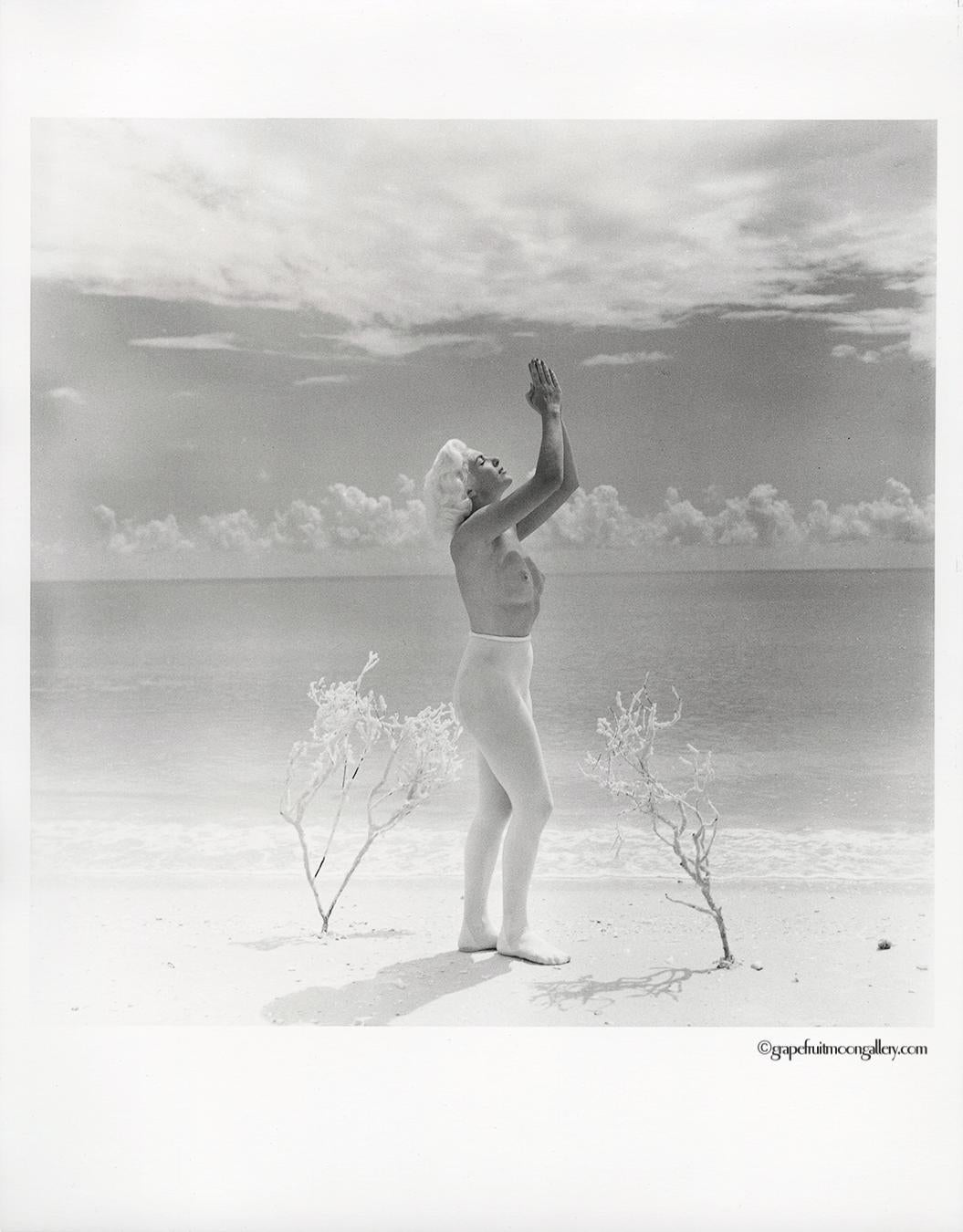Lori Shea Praying To The Sun - Photograph by Bunny Yeager