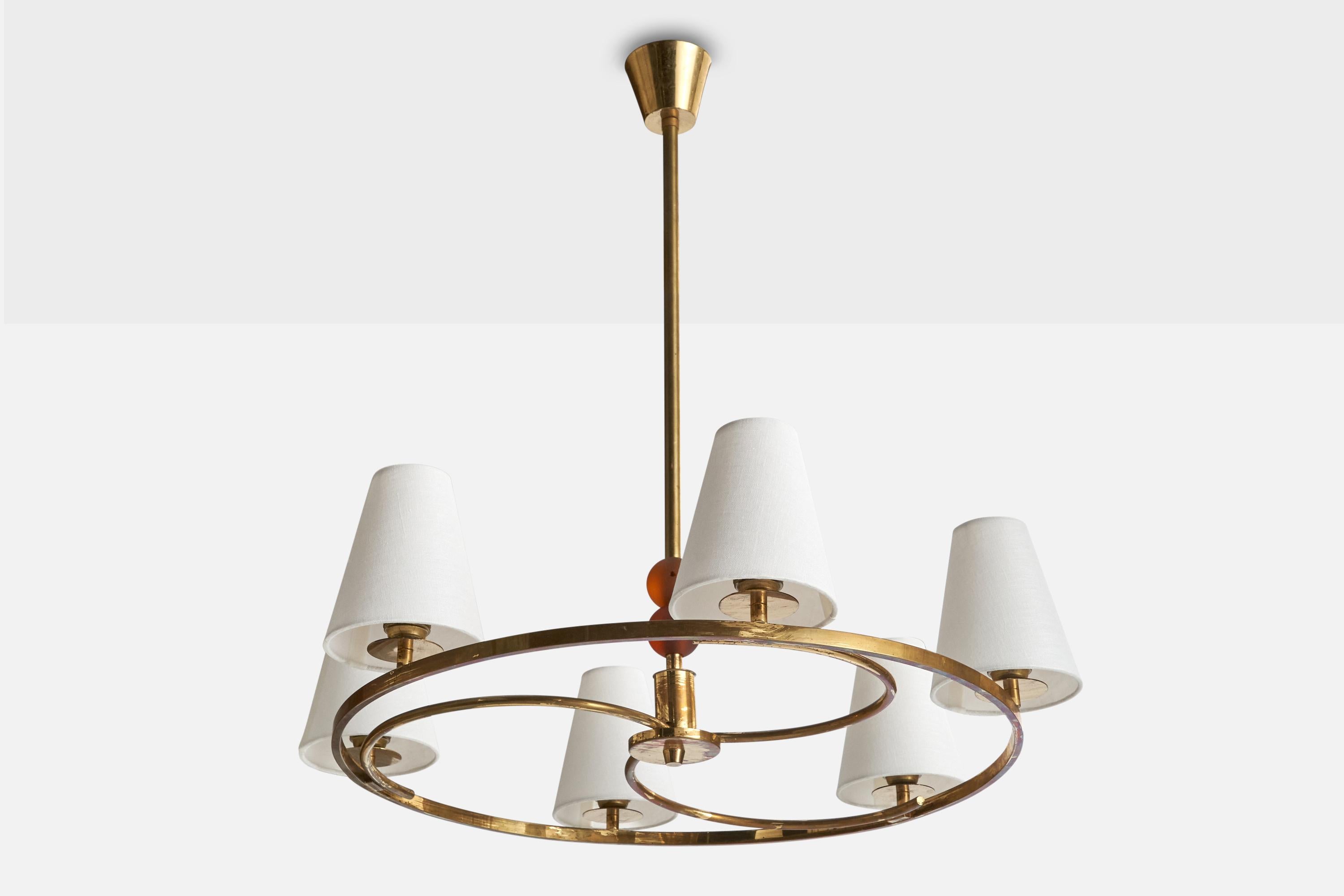 A brass, white fabric and red-colored glass chandelier produced by Bünte & Remmler, Germany, c. 1920s.

Overall Dimensions (inches): 31” H x 27” Diameter

Dimensions of Canopy:  3” H x 3.5” W x 3.5” D

Stem length: 22” H

Bulb Specifications: