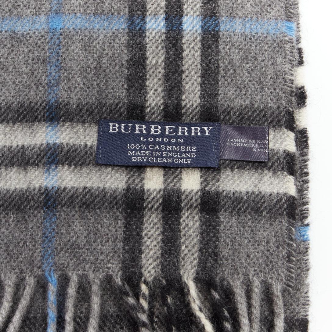 BURBERRY 100% cashmere grey blue House Check long fringe scarf
Reference: CAWG/A00292
Brand: Burberry
Material: Cashmere
Color: Grey, Blue
Pattern: Plaid
Made in: England

CONDITION:
Condition: Excellent, this item was pre-owned and is in excellent