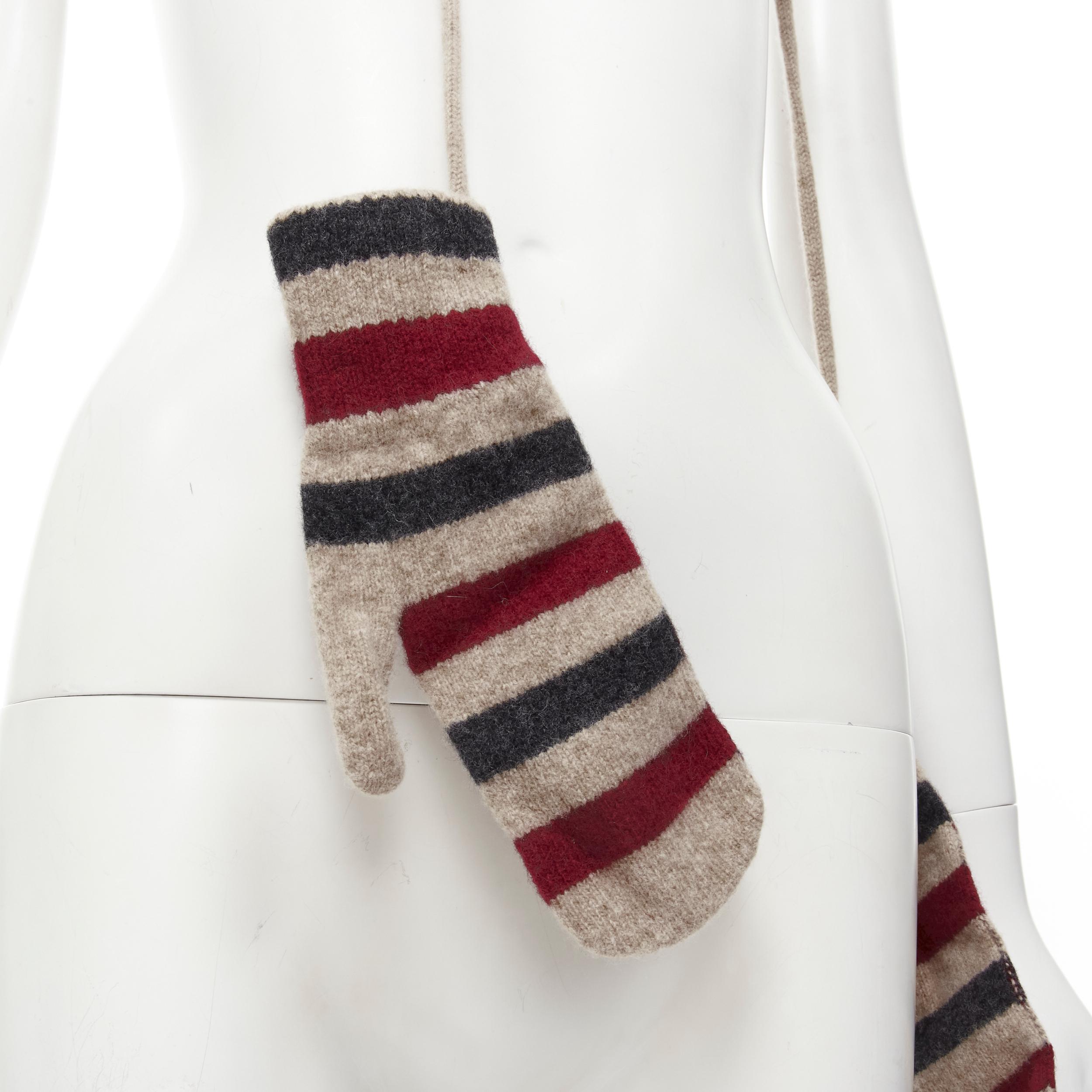 BURBERRY 100% lambs wool red black beige striped mitten glove on string 
Reference: MAWG/A00078 
Brand: Burberry 
Material: Wool 
Color: Beige 
Pattern: Stripe 
Made in: Scotland 

CONDITION: 
Condition: Excellent, this item was pre-owned and is in