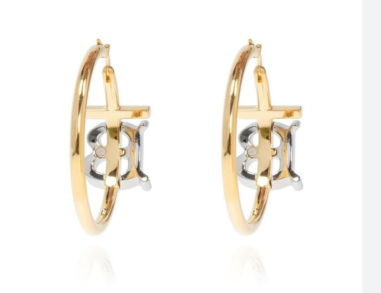  Specification
    Category Earrings
    Brand Burberry
    Recipient For Her, For Him
    Earring Style Hoop Earrings
    Brand Collections Logo
    Metal Type Gold Plated
