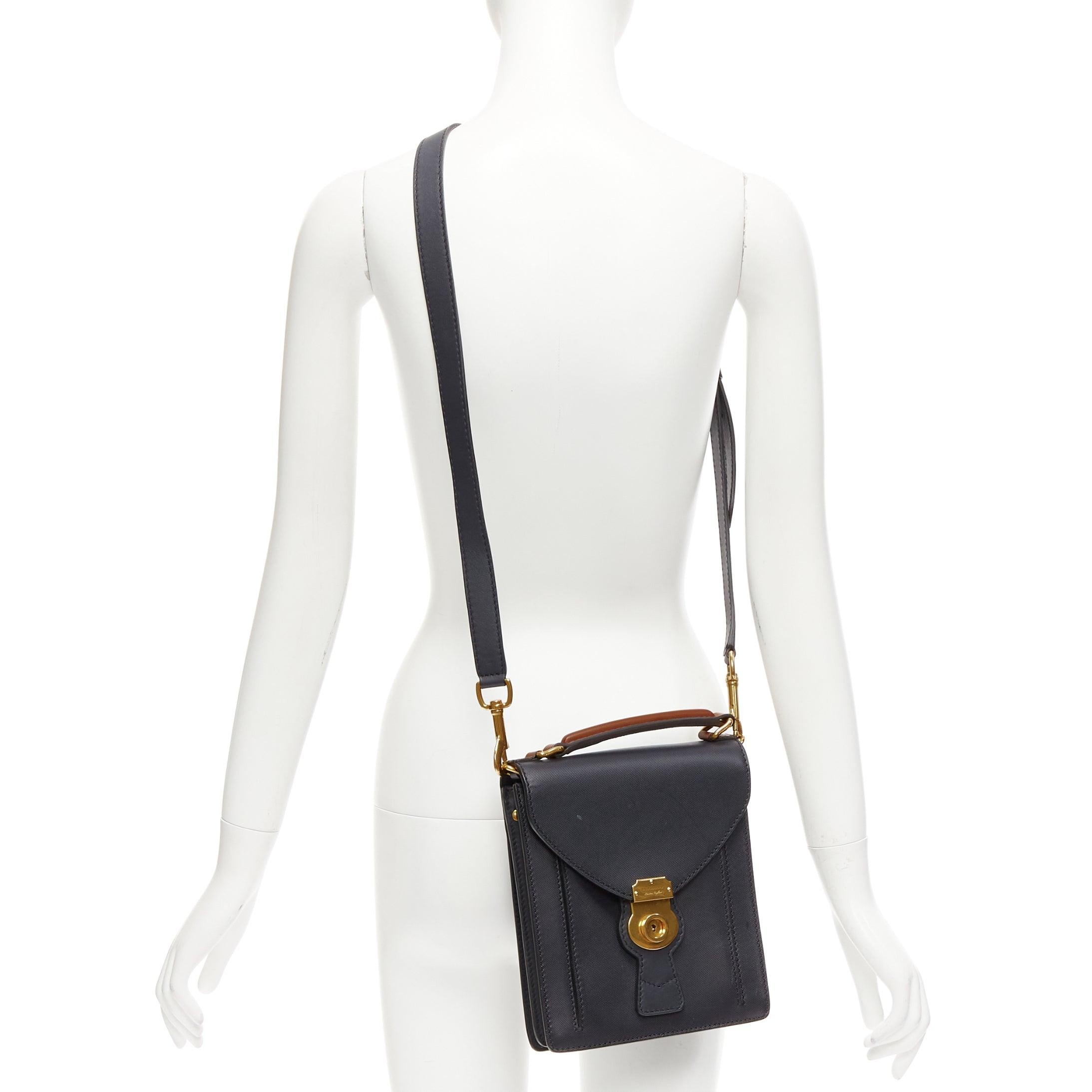 BURBERRY 2017 Runway DK88 black antique gold logo push locket flap crossbody bag
Reference: NKLL/A00239
Brand: Burberry
Model: DK88
Material: Leather
Color: Black, Gold
Pattern: Solid
Closure: Push Lock
Lining: Black Fabric
Extra Details: The DK88