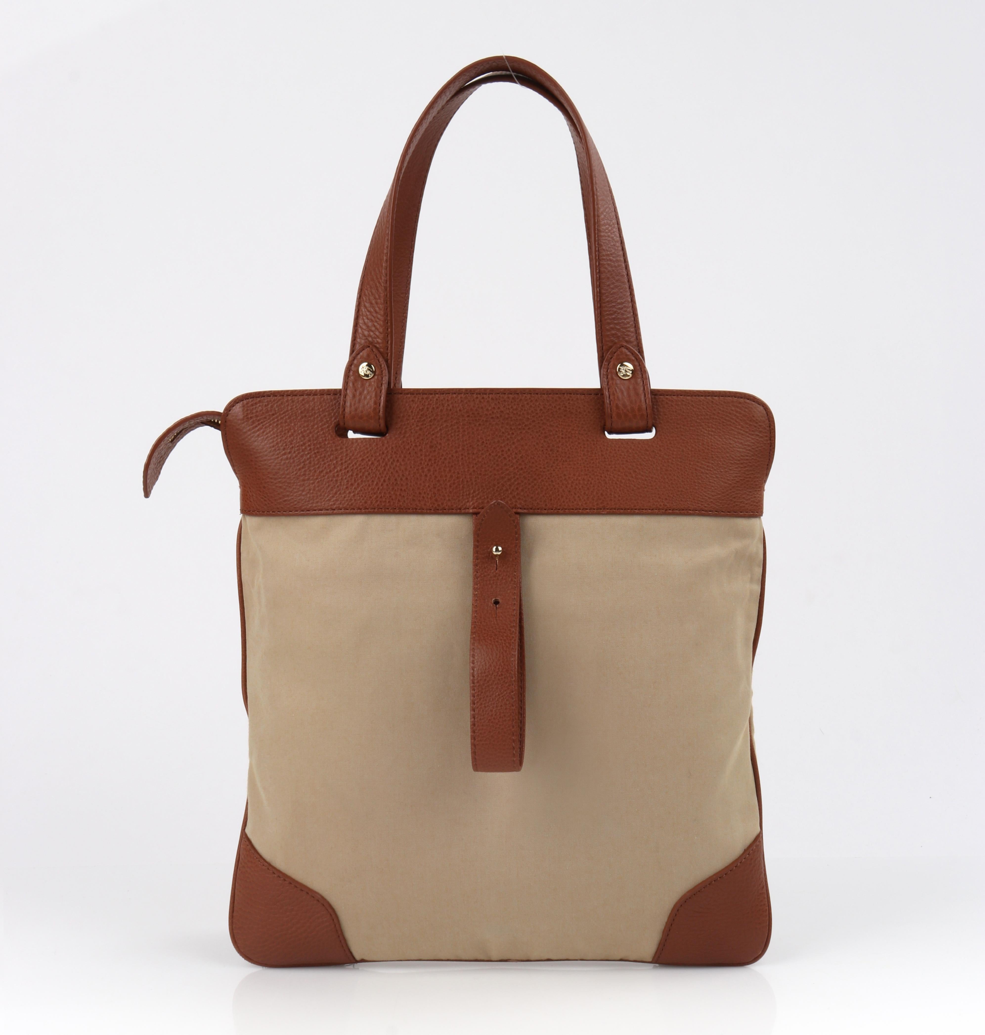 BURBERRY Almond Brown Leather Embroidered Signature Tote Shopper Bag
  
Brand / Manufacturer: Burberry
Designer: Christopher Bailey
Style: Tote / shoulder bag
Color(s): Shades of beige, almond brown (exterior); shades of beige, brown, white, black,