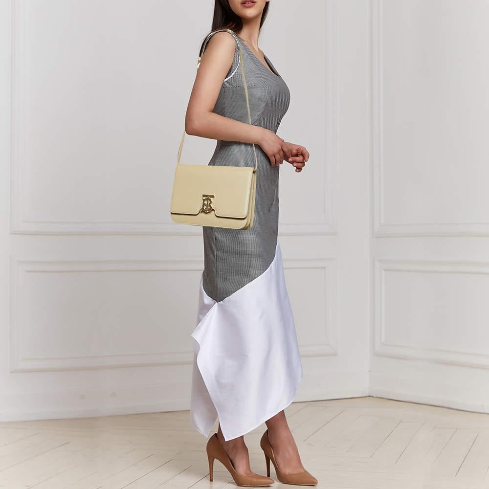 Structured  sophisticated  and stylish are some words that describe this shoulder bag Crafted from quality materials  the creation is adorned with the labels signature appeal and equipped with a well spaced interior.