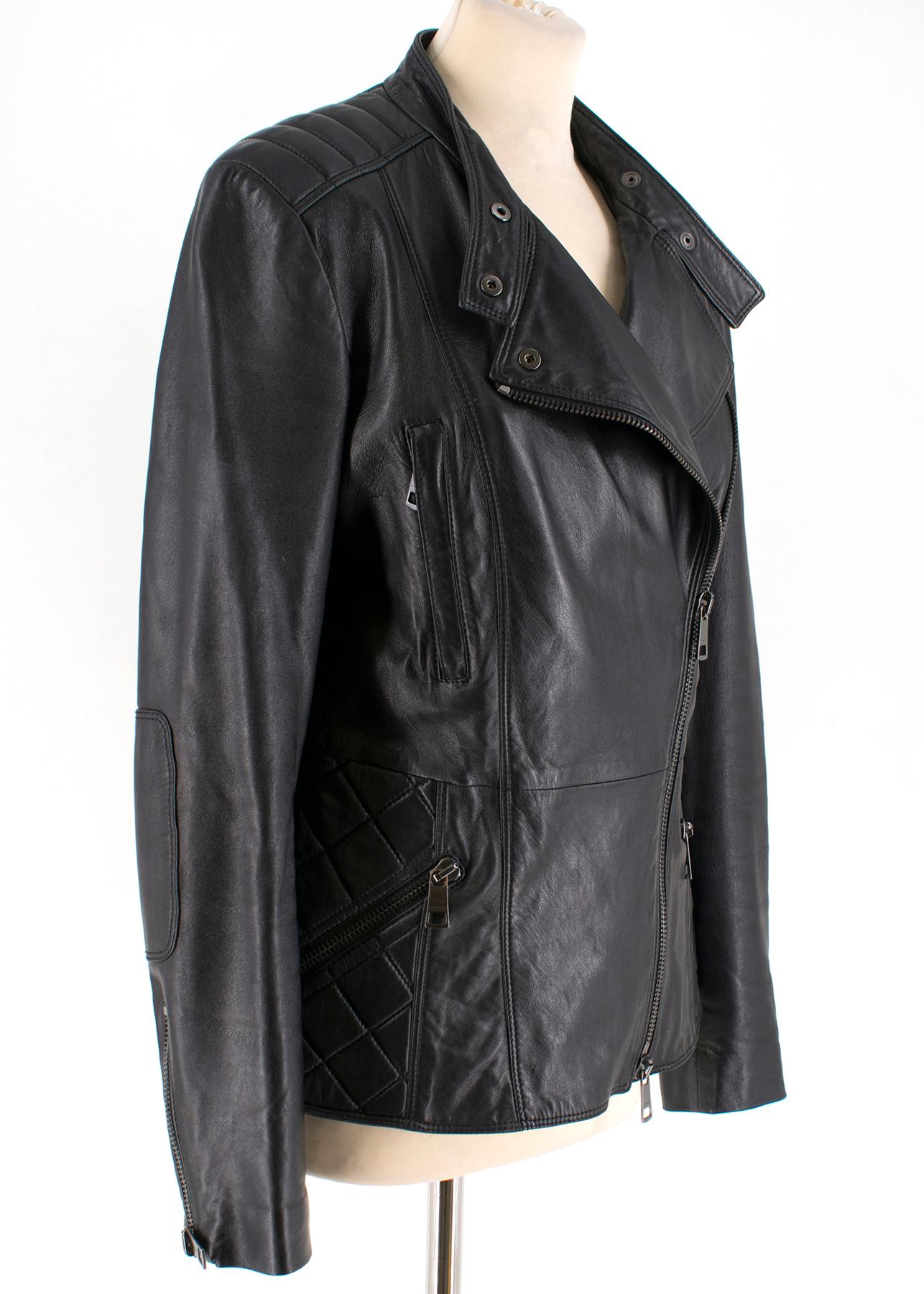 Burberry Asymmetric Zip Black Leather Biker Jacket 

Smooth lambskin leather jacket,
Left centre front zip fastening,
Long sleeves,
Zip up cuffs,
Panel design along shoulders,
Two front chest pockets, 
Snap button collar closure,
Interior features