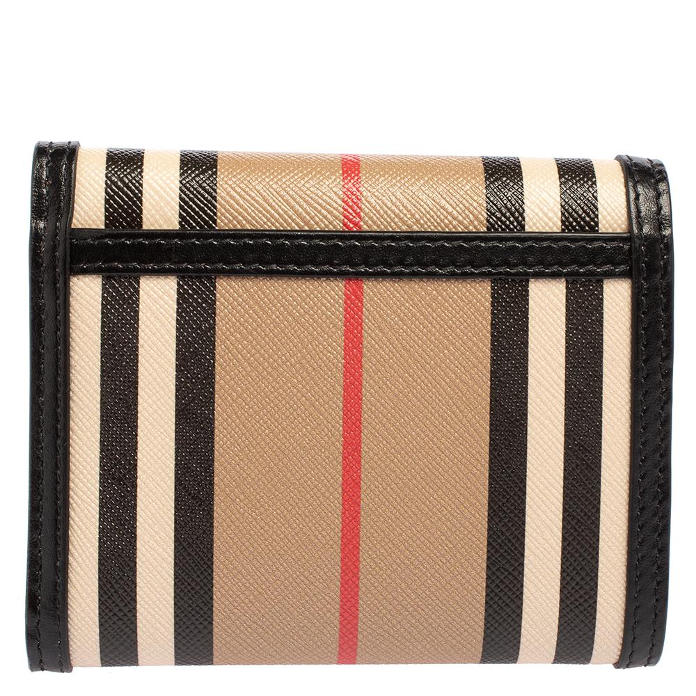 Store your monetary essentials effortlessly in this sturdy wallet. Crafted from Icon stripe coated canvas and leather, this Burberry creation comes in a trifold style and comes with ample space for your IDs and cards.

Includes: Info Booklet