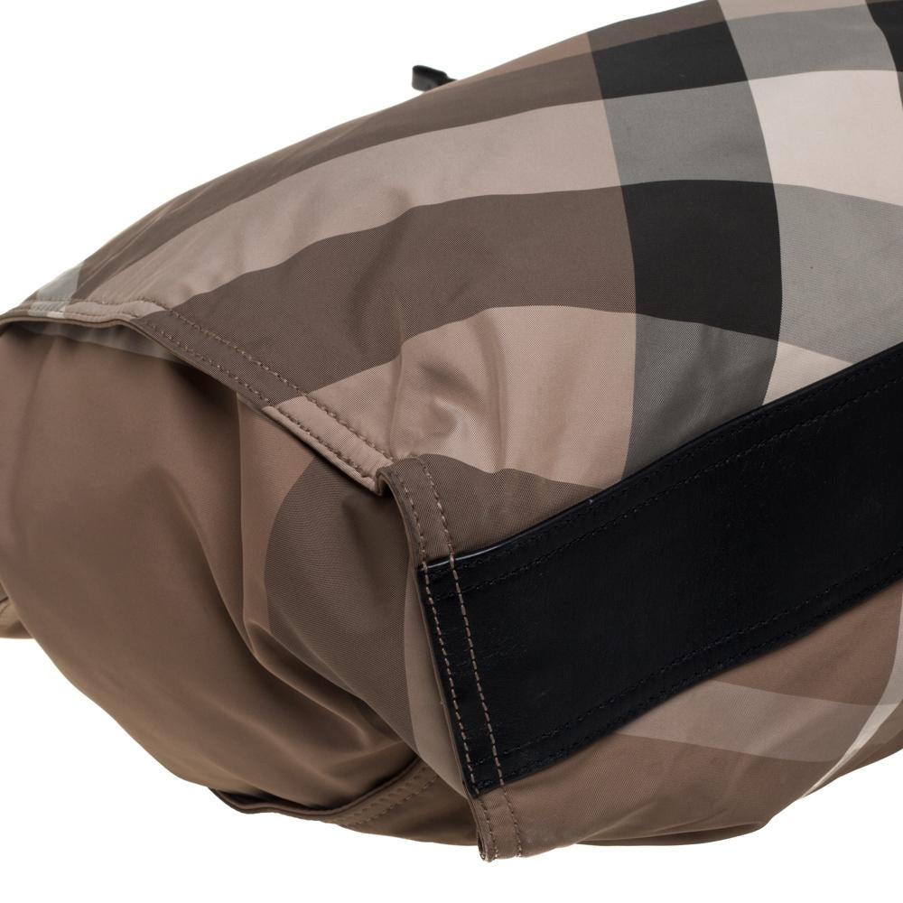 Burberry Beige/Black Nova Check Nylon and Leather Buckleigh ToteThis classy and  3
