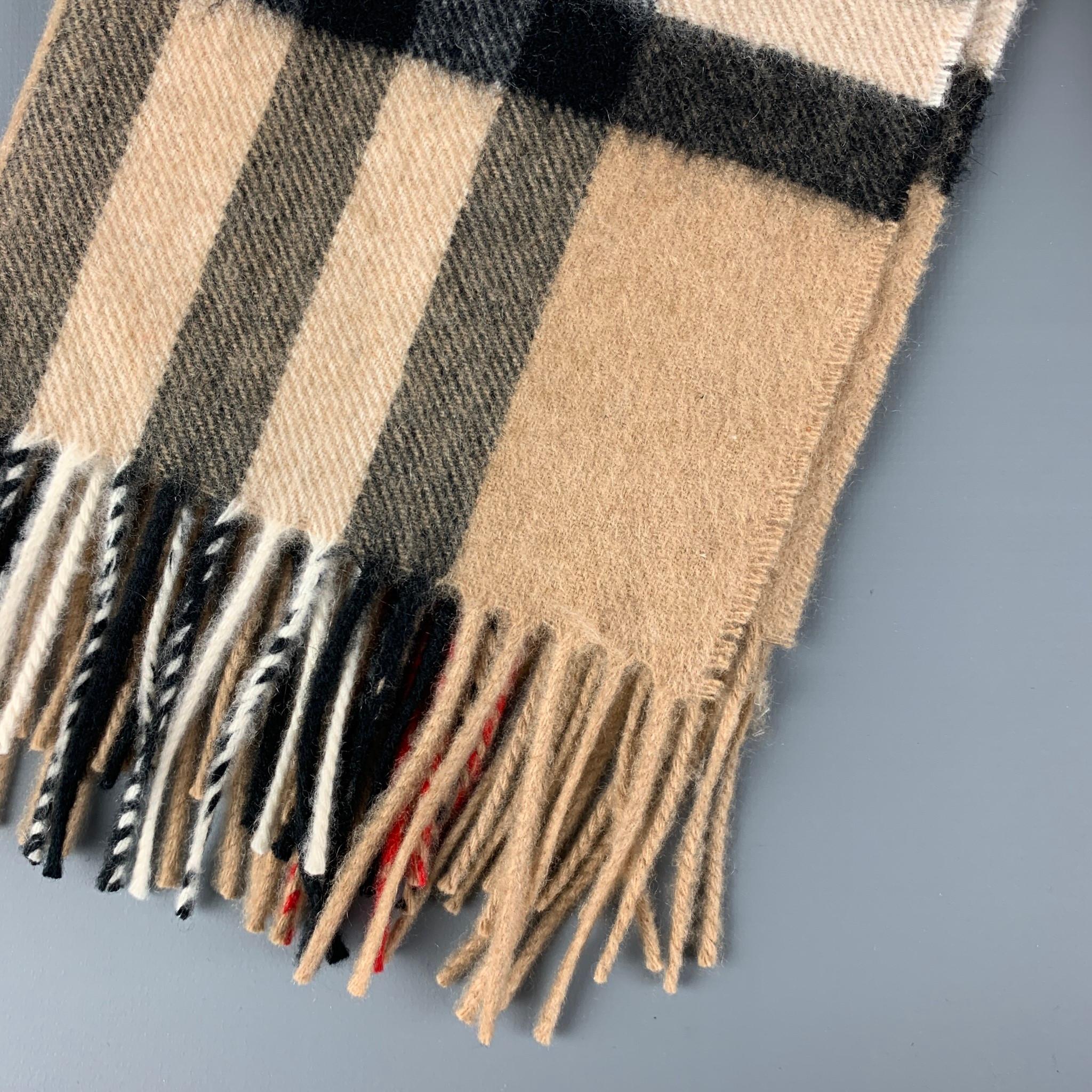 BURBERRY scarf beige & black plaid cashmere with a two and half fringe trim. 

Excellent Pre-Owned Condition.
Original Retail Price: $470.00

Measurements:

68 in. x 12 in. 
