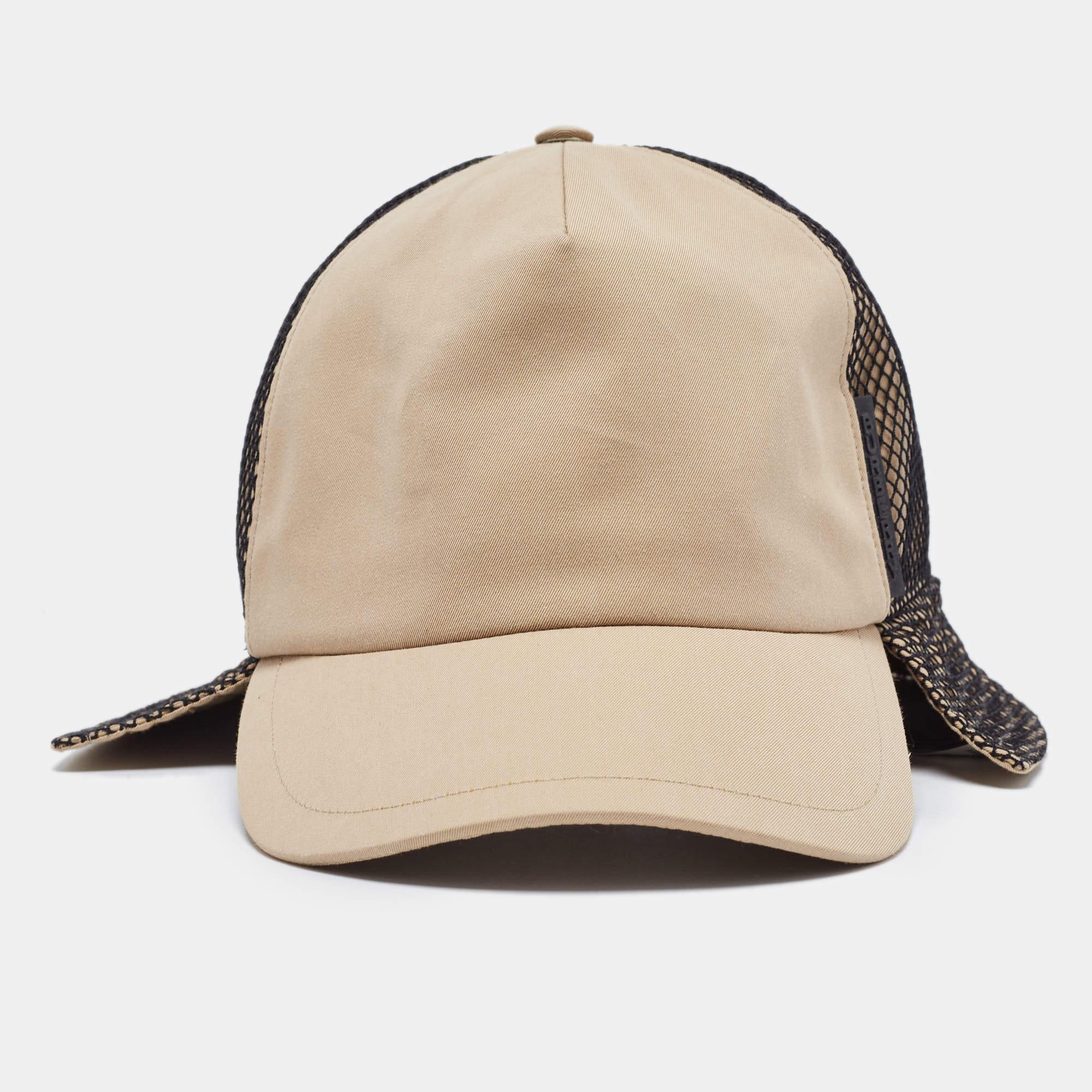 The Burberry hat combines classic elegance with contemporary flair. Crafted from premium beige cotton, it features a mesh panel for breathability. This hat is a versatile accessory, blending style and functionality effortlessly.

Includes: Brand Tag