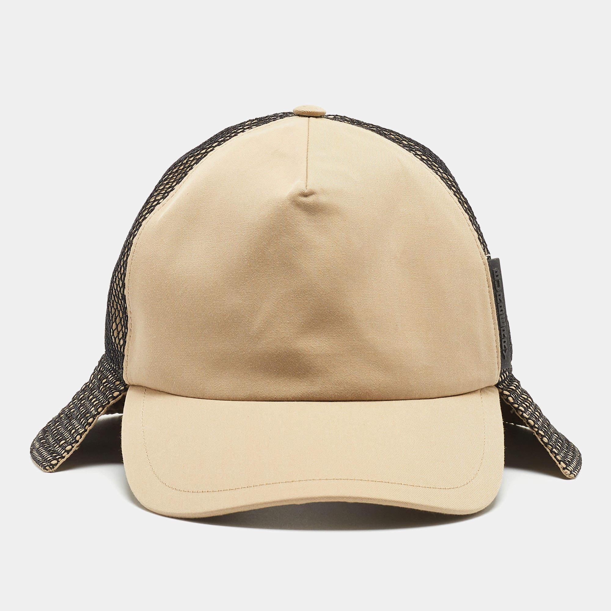 The Burberry hat combines classic elegance with contemporary flair. Crafted from premium beige cotton, it features a mesh panel for breathability. This hat is a versatile accessory, blending style and functionality effortlessly.

Includes: Price Tag