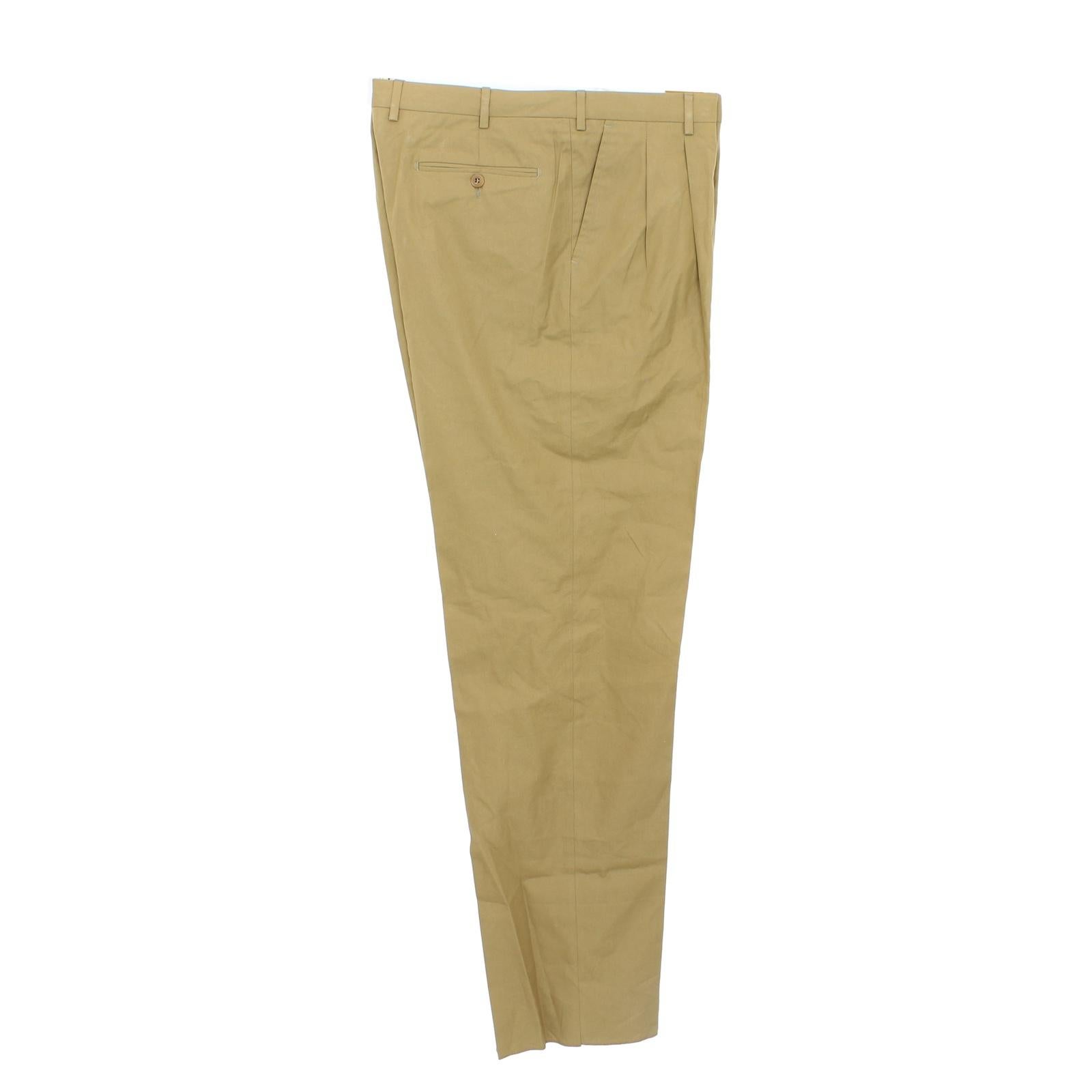 Burberry vintage 90s trousers. Classic model, beige colour, 100% cotton fabric. Made in Italy. New from warehouse stock.

Size: 56 It 46 Us 46 Uk

Waist: 48 cm
Length: 122 cm
Hem: 21 cm
Inseam length: 95 cm