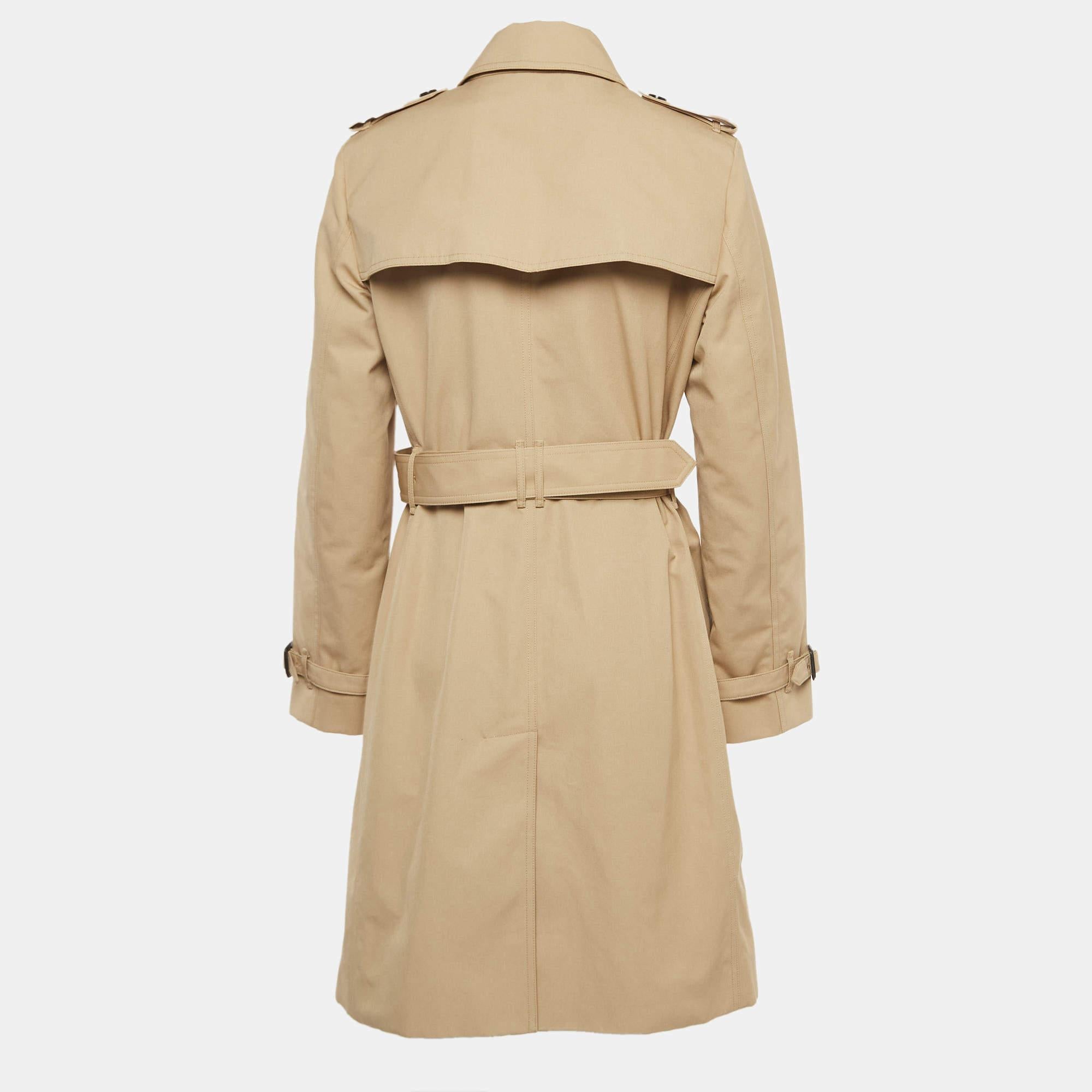 Burberry's trench coats are a dream addition to any woman's closet. Crafted from quality materials, it has a well-tailored silhouette and classic details.

