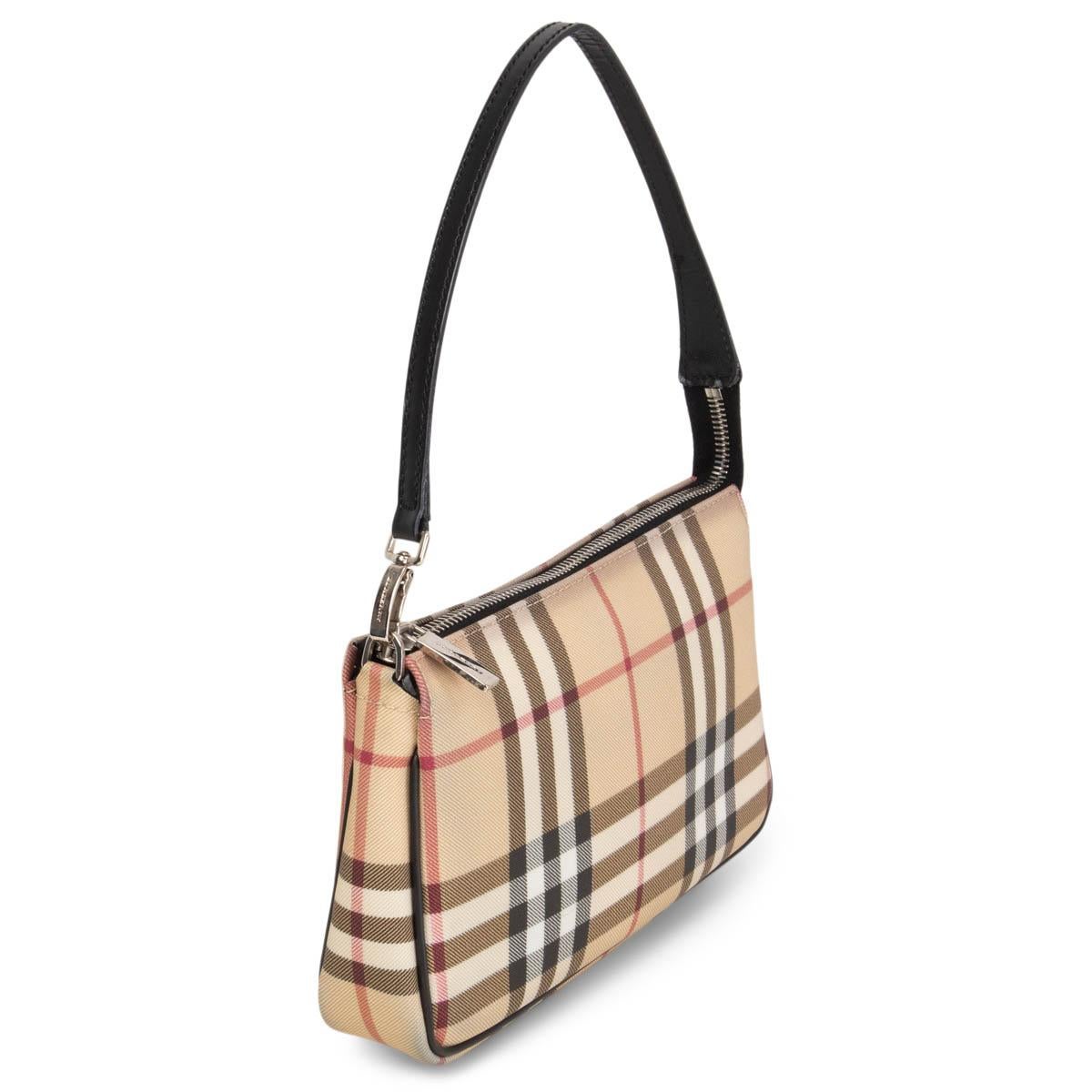 100% authentic Burberry pochette is crafted from signature classic check in beige, white, black and red coated canvas. A zip closure opens to a black canvas lined interior. Has been carried and is in excellent condition. 

Measurements
Height	13cm