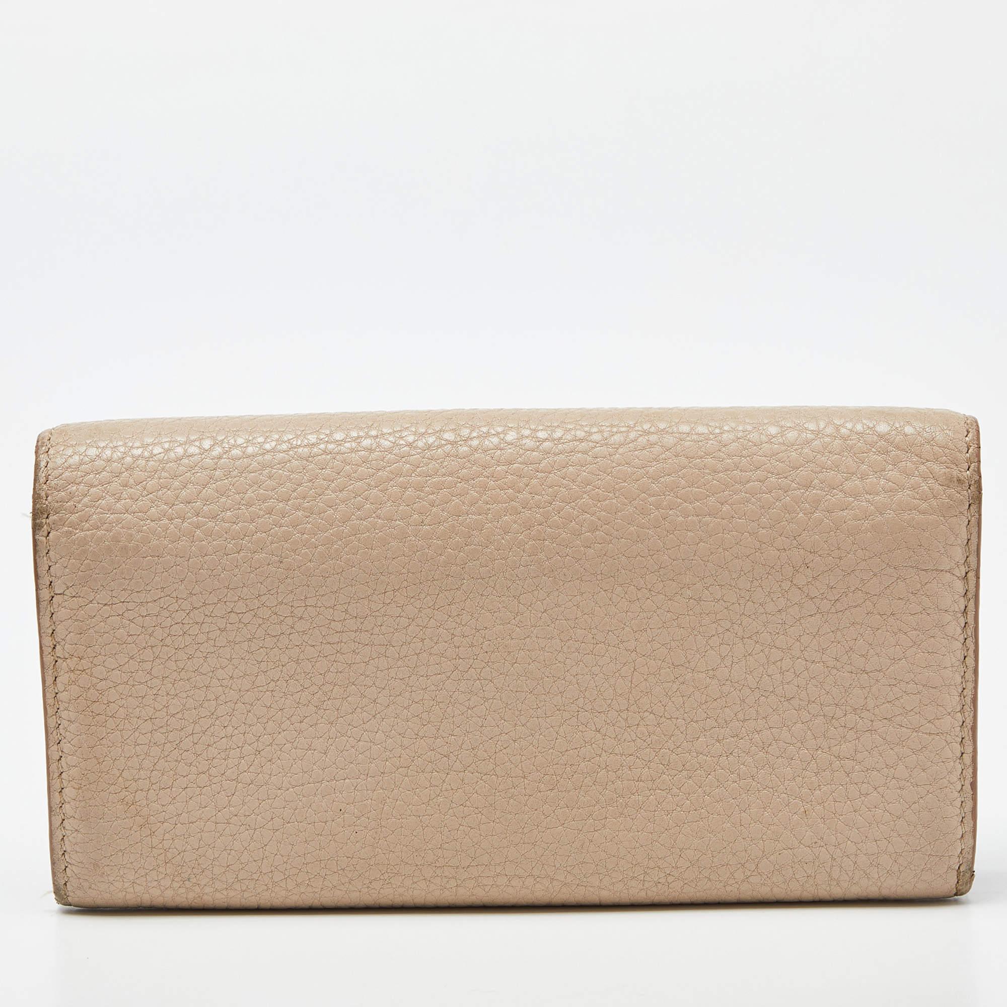 Donna Portafoglio continentale con fiocco in pelle beige di Burberry in vendita