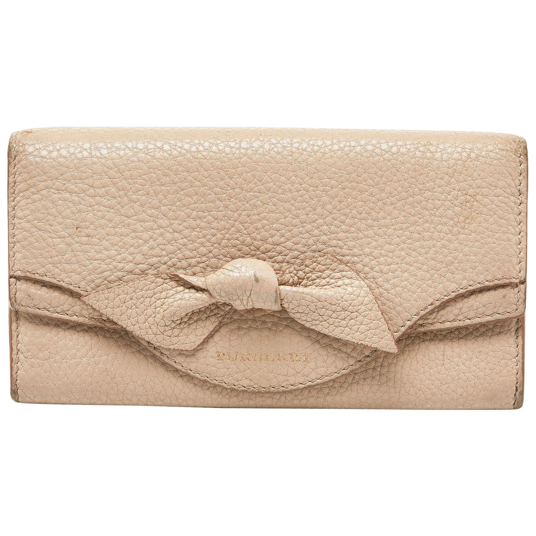 Burberry Cartera Continental de Piel Beige con Lazo