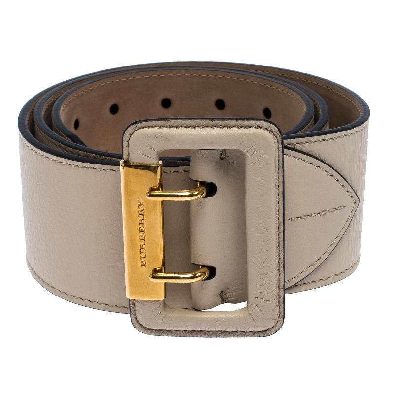 Accessorise right with this lovely waist belt from Burberry. It is beautifully made from leather and detailed with a double pin buckle. The beige Cecile belt can be worn to cinch skirts and dresses.

Includes: Original Dustbag, Price Tag

