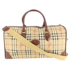 Burberry Duffle Boston à carreaux beige Nova avec sangle 39b517s