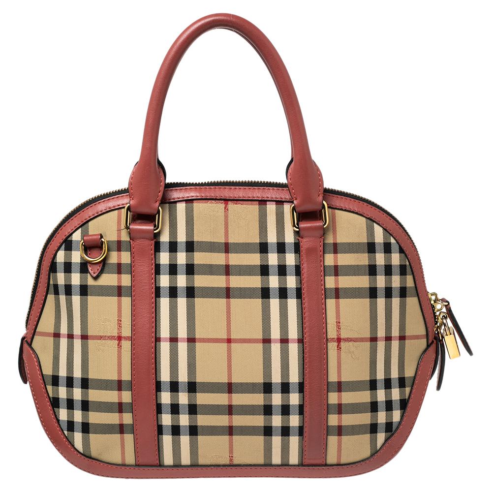 Finely crafted and richly designed, this Burberry piece is surely a must-have in every woman's collection. It is made from Haymarket Check canvas as well as leather and features two handles and a spacious fabric interior. Ideal for any day, this bag