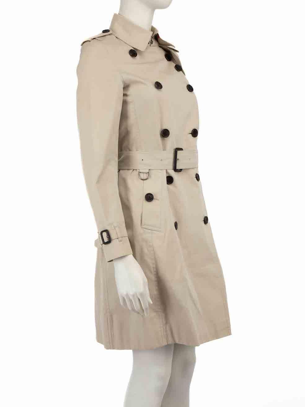 CONDITION is Very good. Minimal wear to coat. A small abrasion and some discolouration to belt edge and inside neck on this used Burberry Brit designer resale item.
 
 
 
 Details
 
 
 Red
 
 Nylon
 
 Waterproof trench coat
 
 Mid length
 
 Double