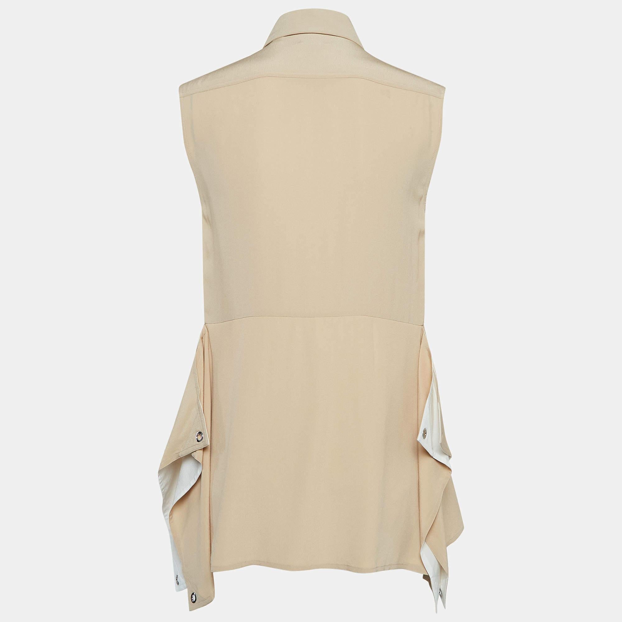 Completa la tua eleganza con una bella camicetta come questa. Con il suo design grazioso e il tessuto di prima qualità, questa blusa è la scelta migliore per apparire sofisticata e in equilibrio.

Include: Etichetta del marchio e bottoni extra


