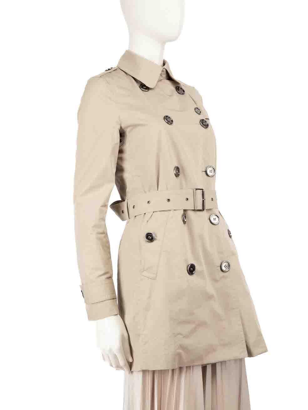 CONDITION is Very good. Hardly any visible wear to the trench coat is evident on this used Burberry designer resale item.
 
 
 
 Details
 
 
 Beige
 
 Cotton
 
 Trench coat
 
 Double breasted
 
 Belted
 
 Long sleeves
 
 Buttoned cuffs
 
 Button up