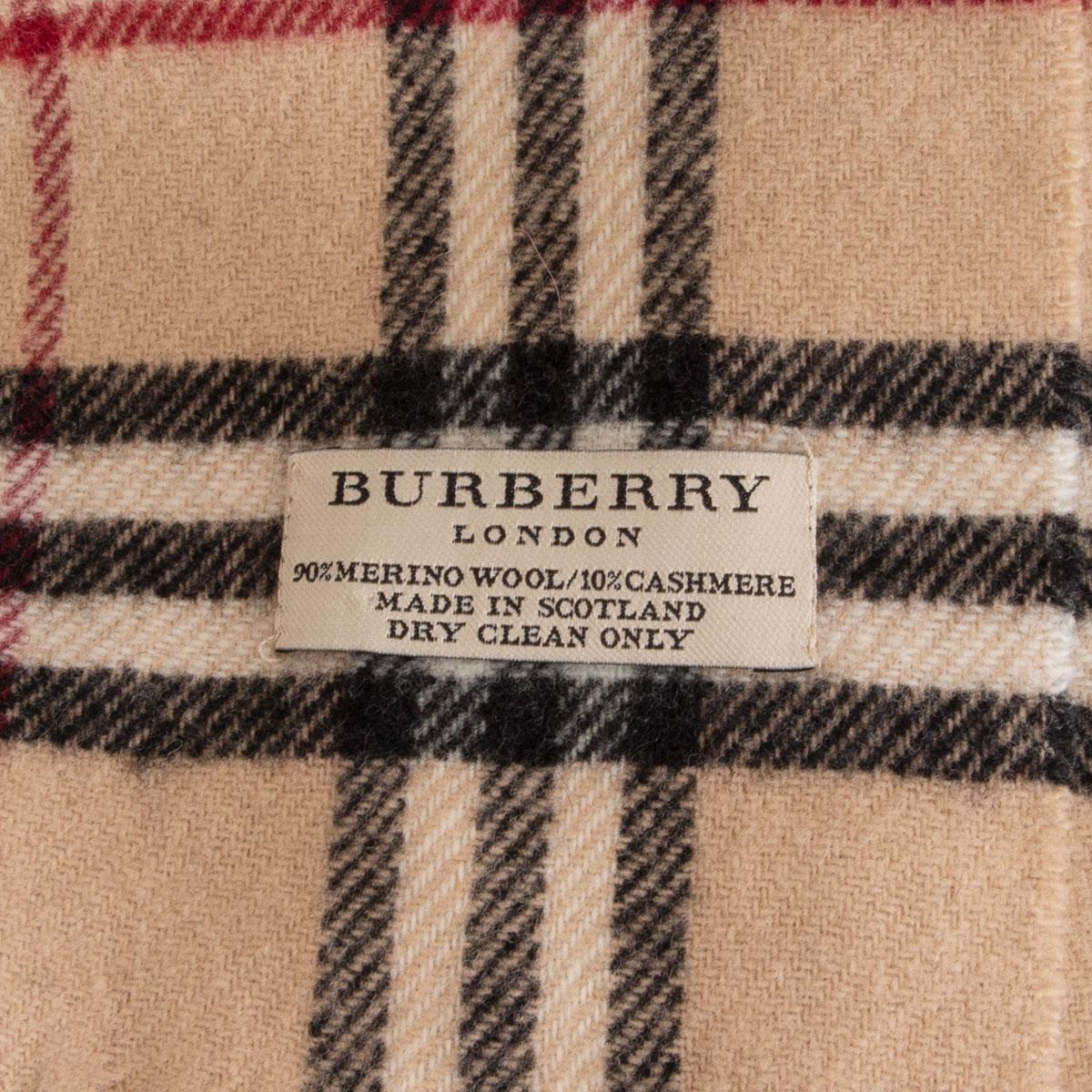 100% authentic Burberry London classic check shawl in beige, black, red and off-white merino (90%) and cashmere (10%). Has been worn and is in excellent condition. 

Measurements
Width	30.5cm (11.9in)
Length	134cm (52.3in)

All our listings include