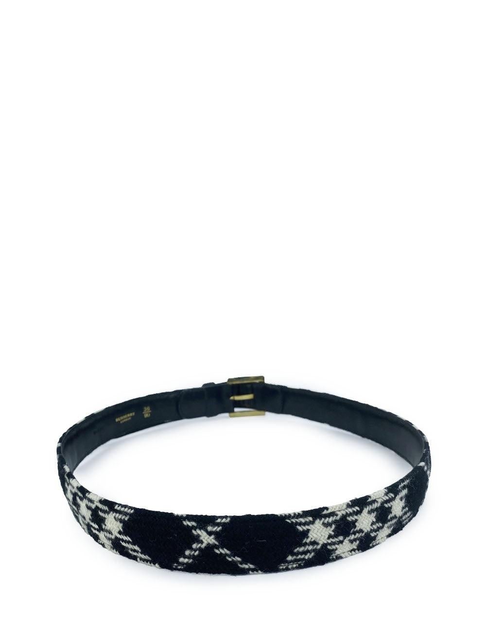 Black and White Check Belt.

Additional information:
Hardware: Gold Tone
Size: 36
Condition: Gently Loved