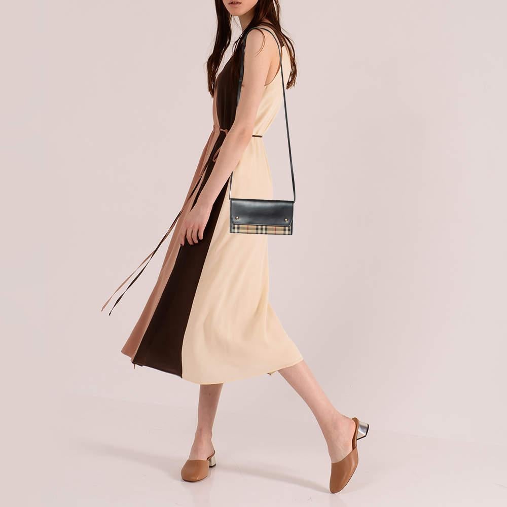 This elegant crossbody bag is perfect for your next outing to town. It is made of high-quality leather and can match a day or evening outfit. It has a long strap and a lined interior secured by a flap.

Includes
Original Dustbag
