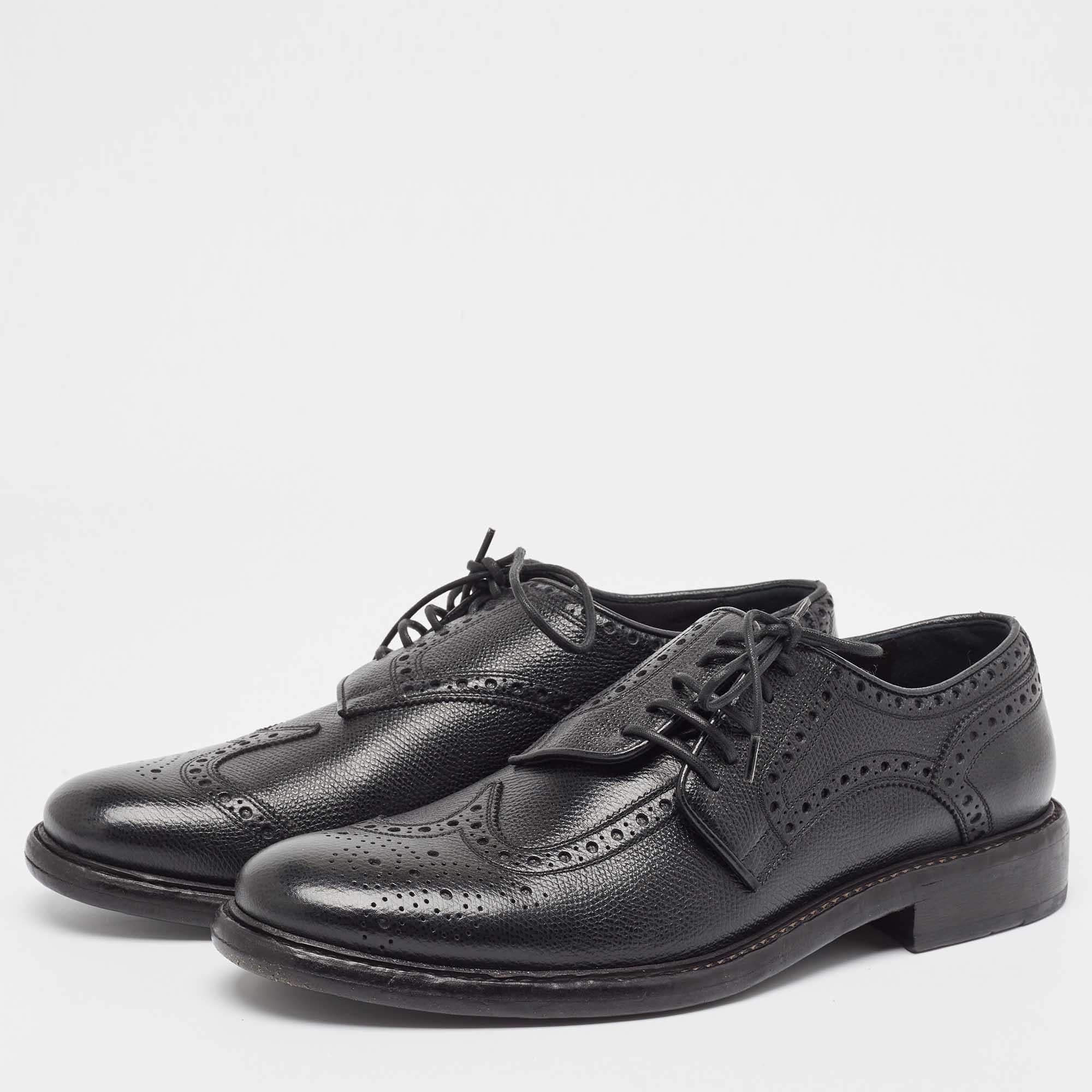 Led by a side lace up detail on the vamps these black Derby shoes from Burberry are utterly stylish. They are crafted from leather and designed with brogue accents and tough soles for durable wear.