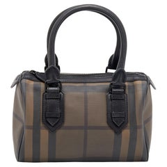 Burberry Chester Duffel-Tasche aus schwarzem/braunem Leder und rauchfarbenem PVC